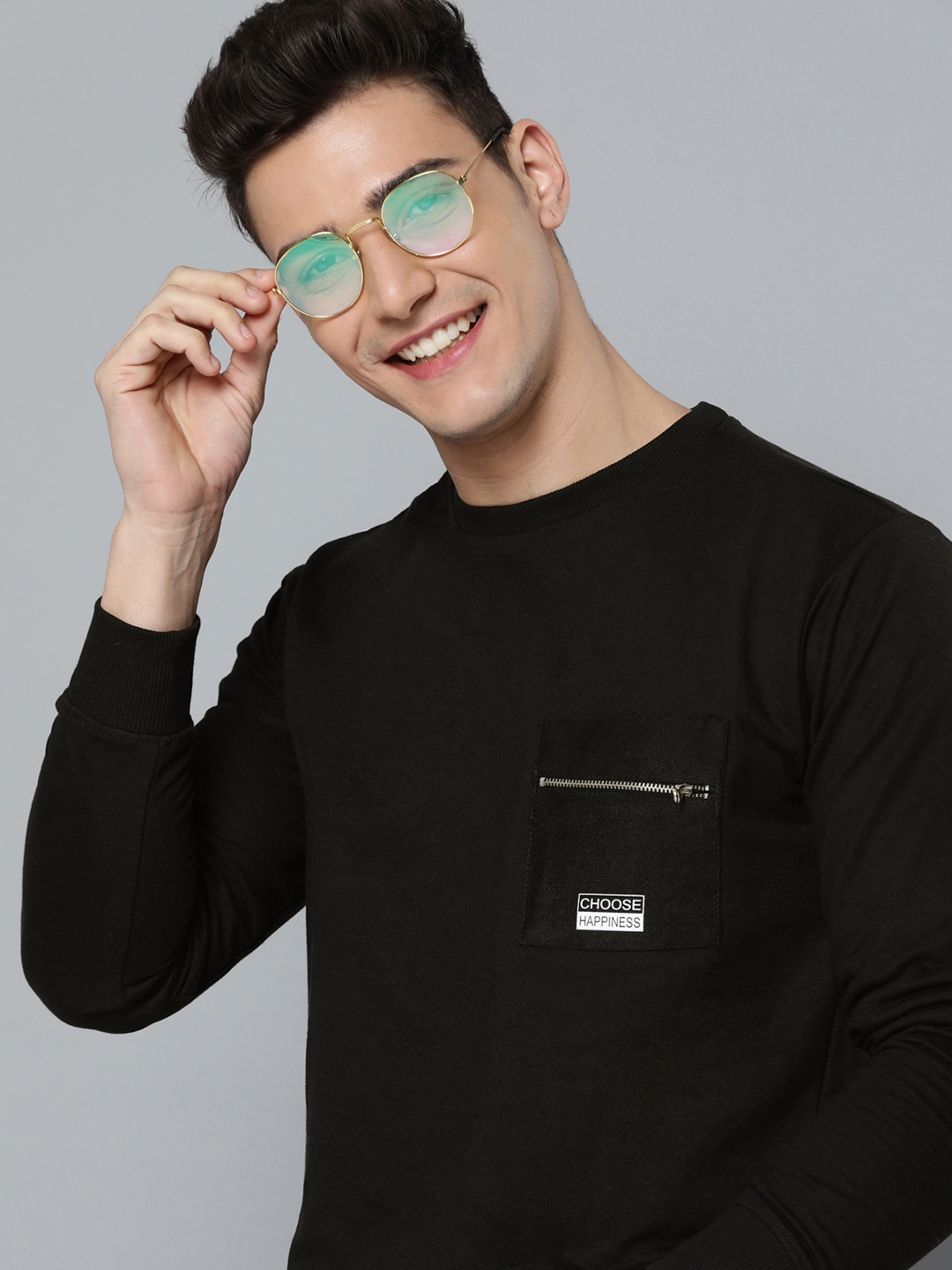 

Mast & Harbour Men Black Solid Sweatshirt
