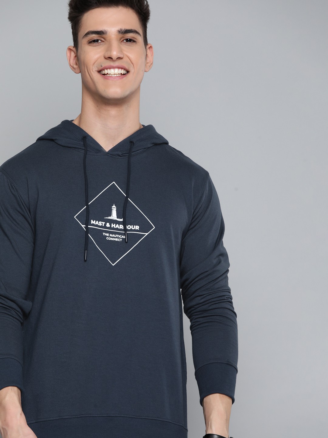 

Mast & Harbour Men Navy Blue Printed Hooded Sweatshirt