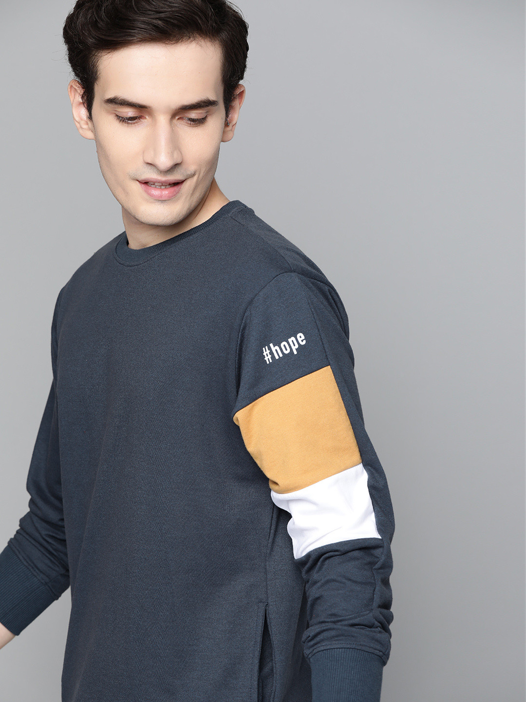 

Mast & Harbour Men Navy Blue Solid Sweatshirt