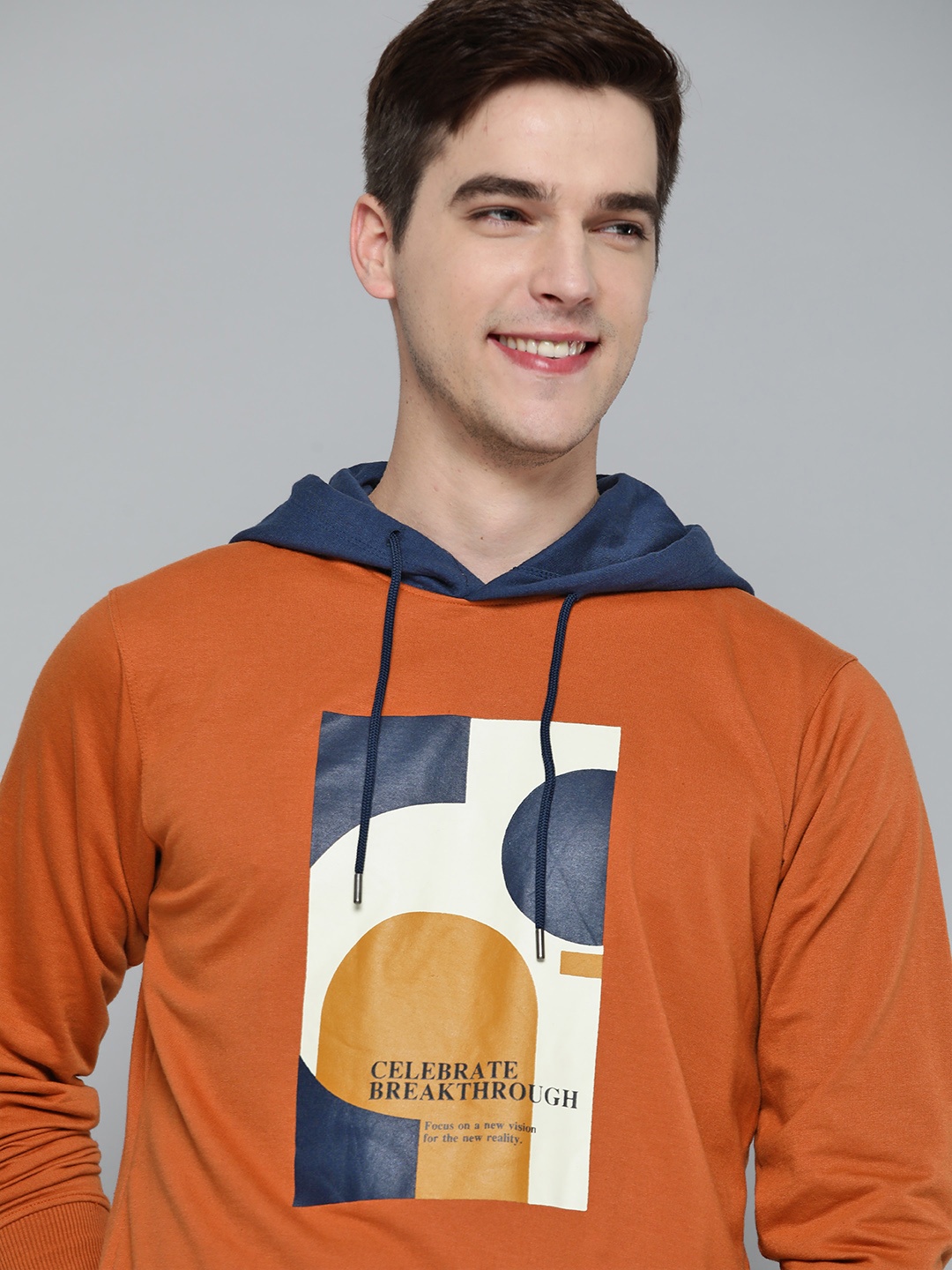 

Mast & Harbour Men Rust Orange & Navy Printed Hooded Sweatshirt