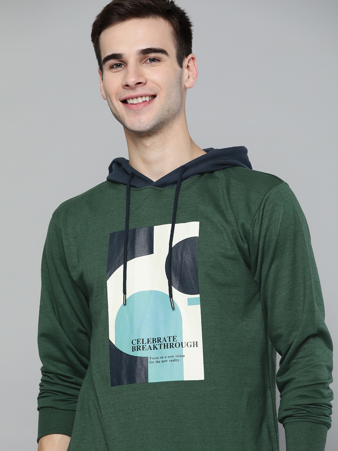 

Mast & Harbour Men Green Printed Hooded Pullover Sweatshirt