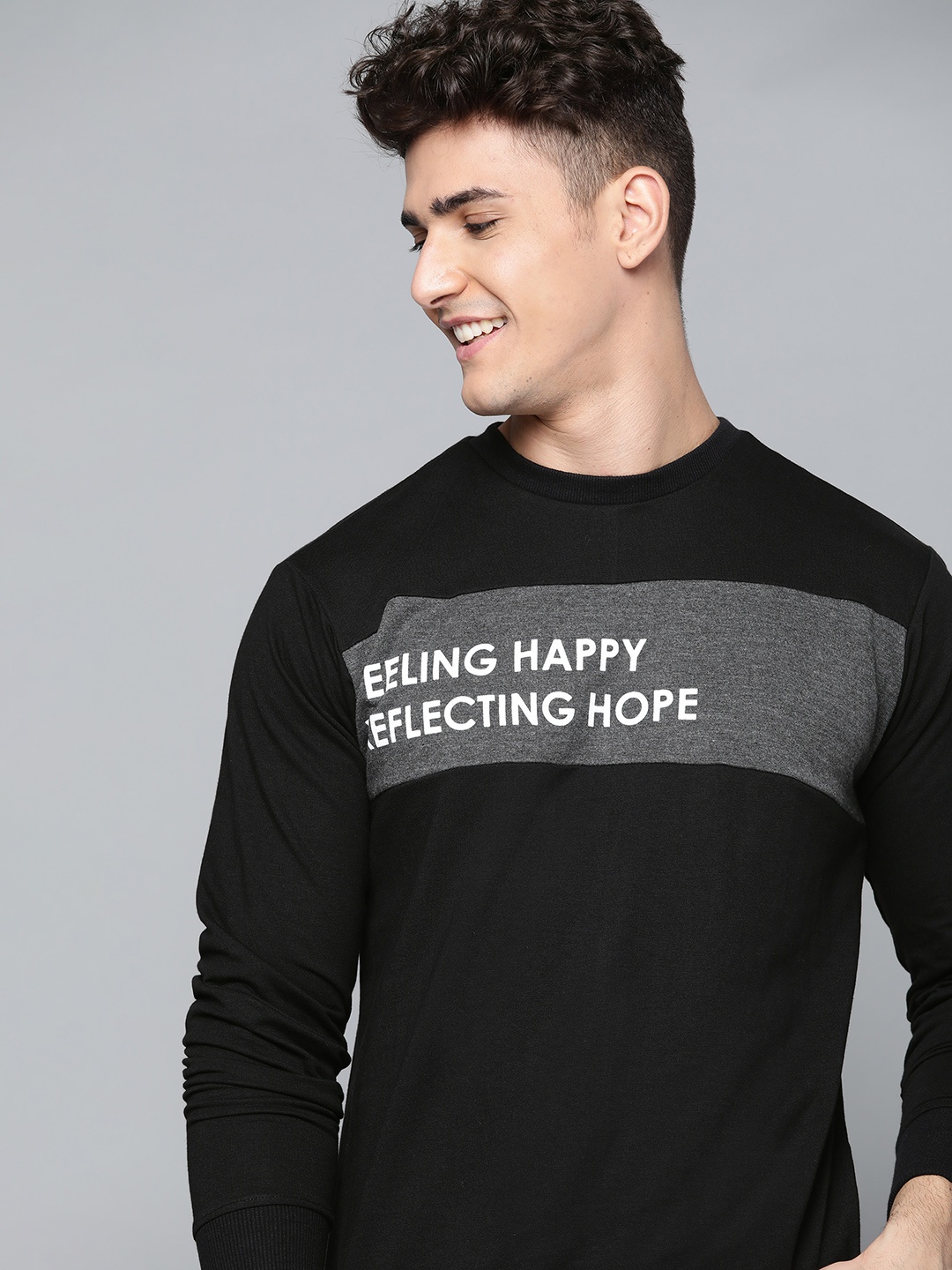 

Mast & Harbour Men Black Striped Sweatshirt