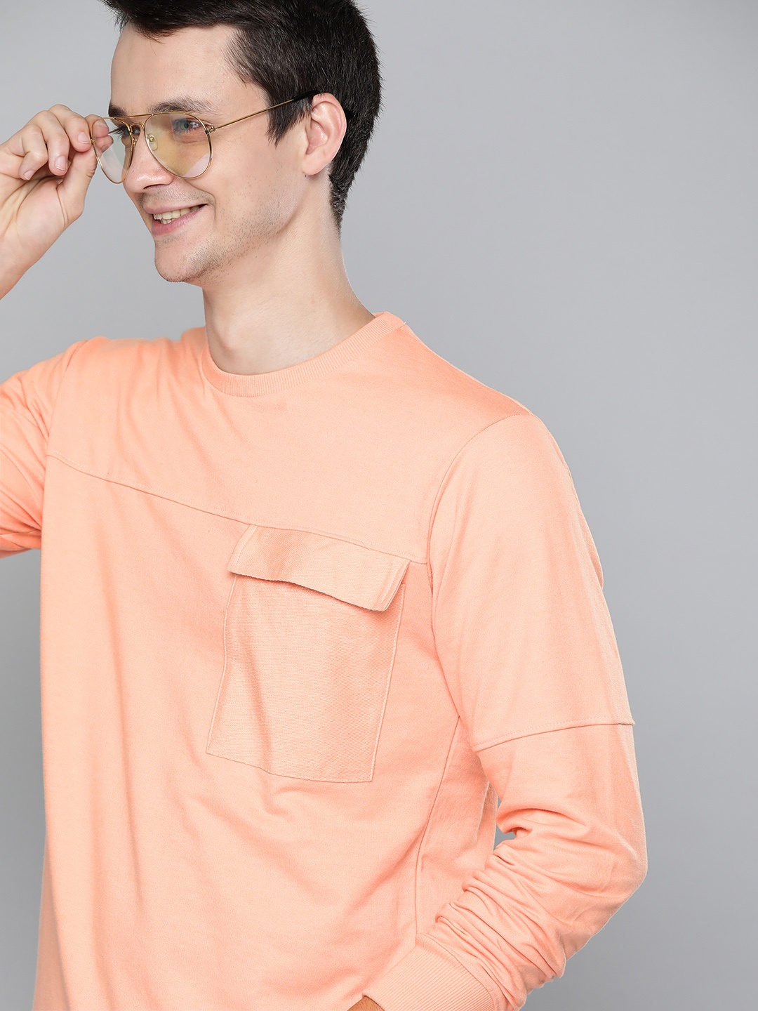 

Mast & Harbour Men Peach-Coloured Solid Sweatshirt