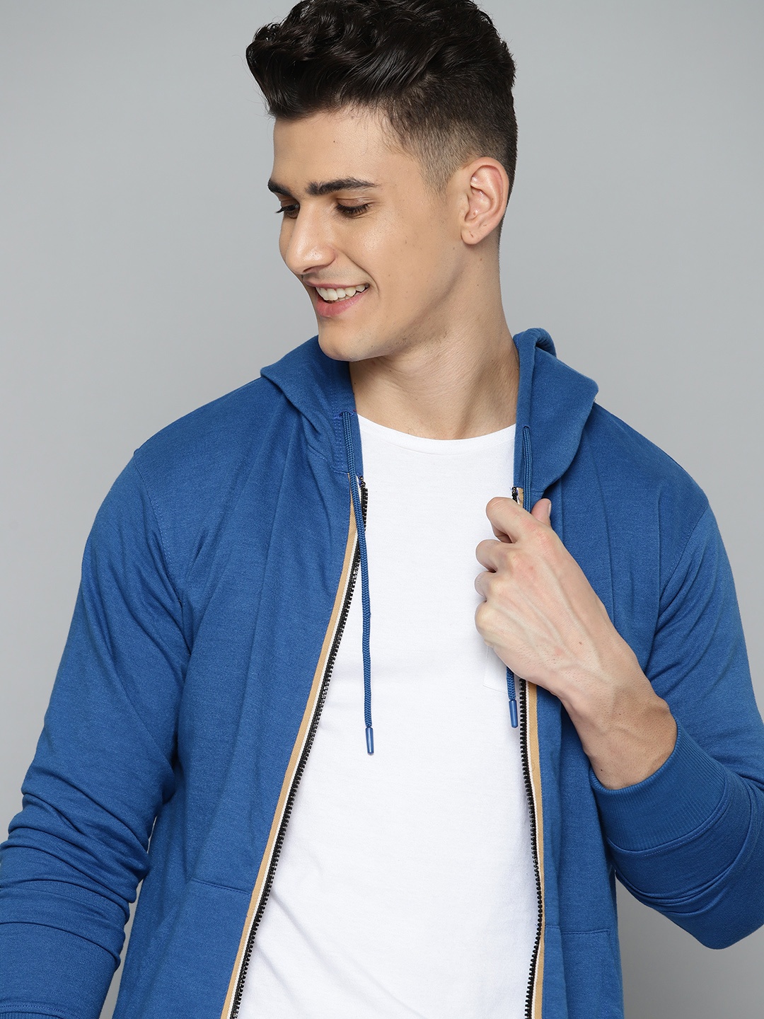 

Mast & Harbour Men Blue Solid Hooded Sweatshirt