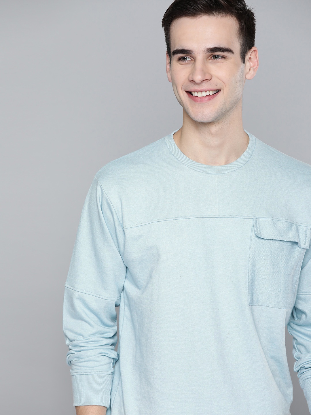 

Mast & Harbour Men Blue Solid Sweatshirt