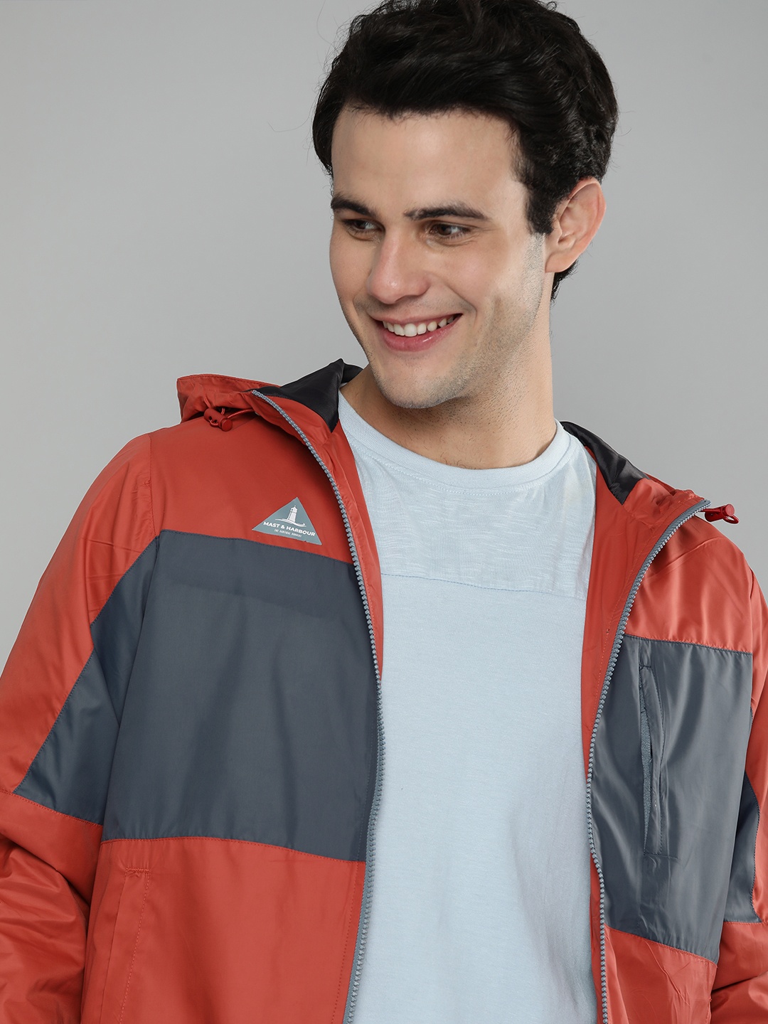 

Mast & Harbour Men Red & Navy Blue Colourblocked Hooded Jacket