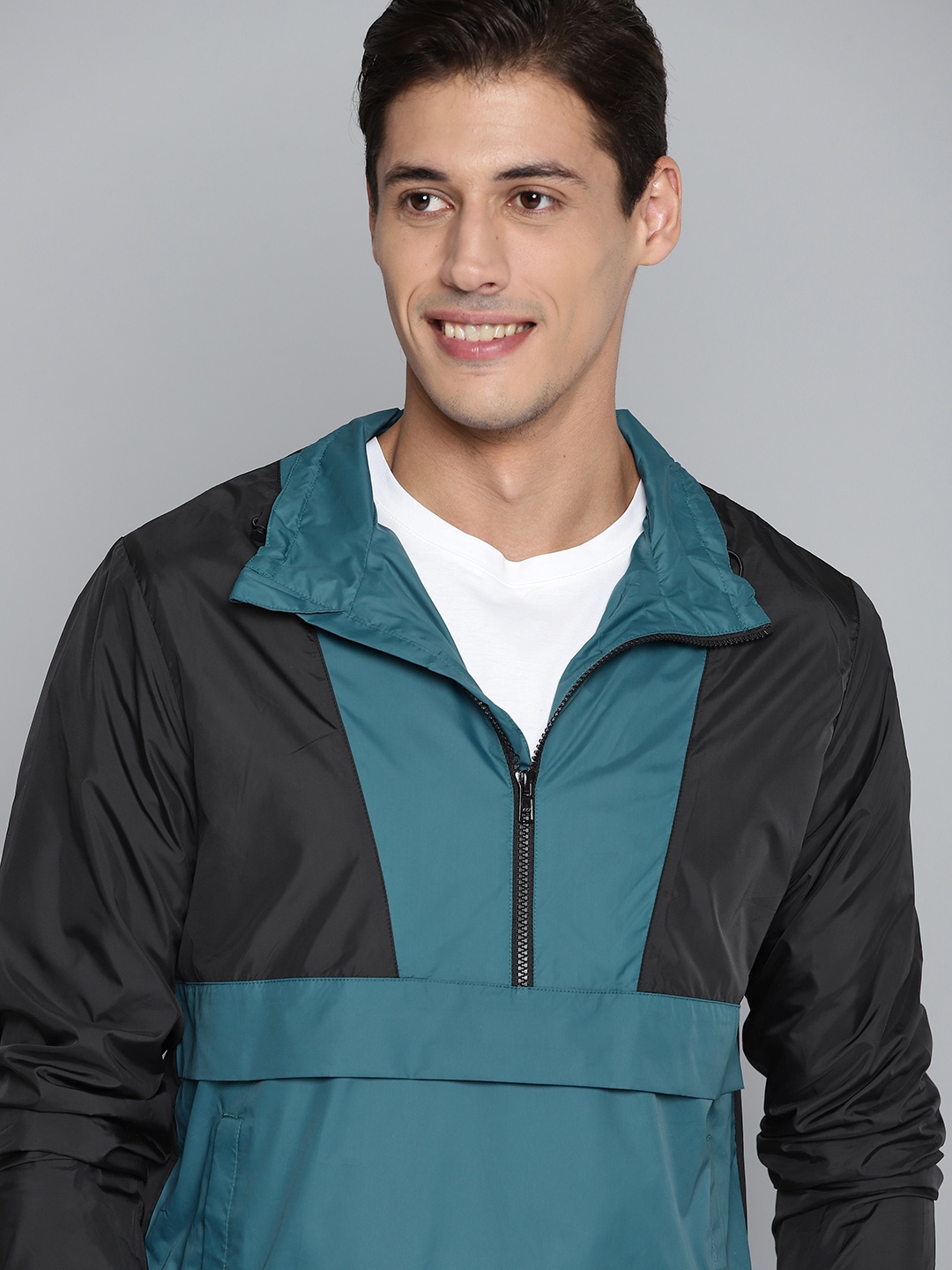 

Mast & Harbour Men Teal Green & Black Colourblocked Bomber Jacket