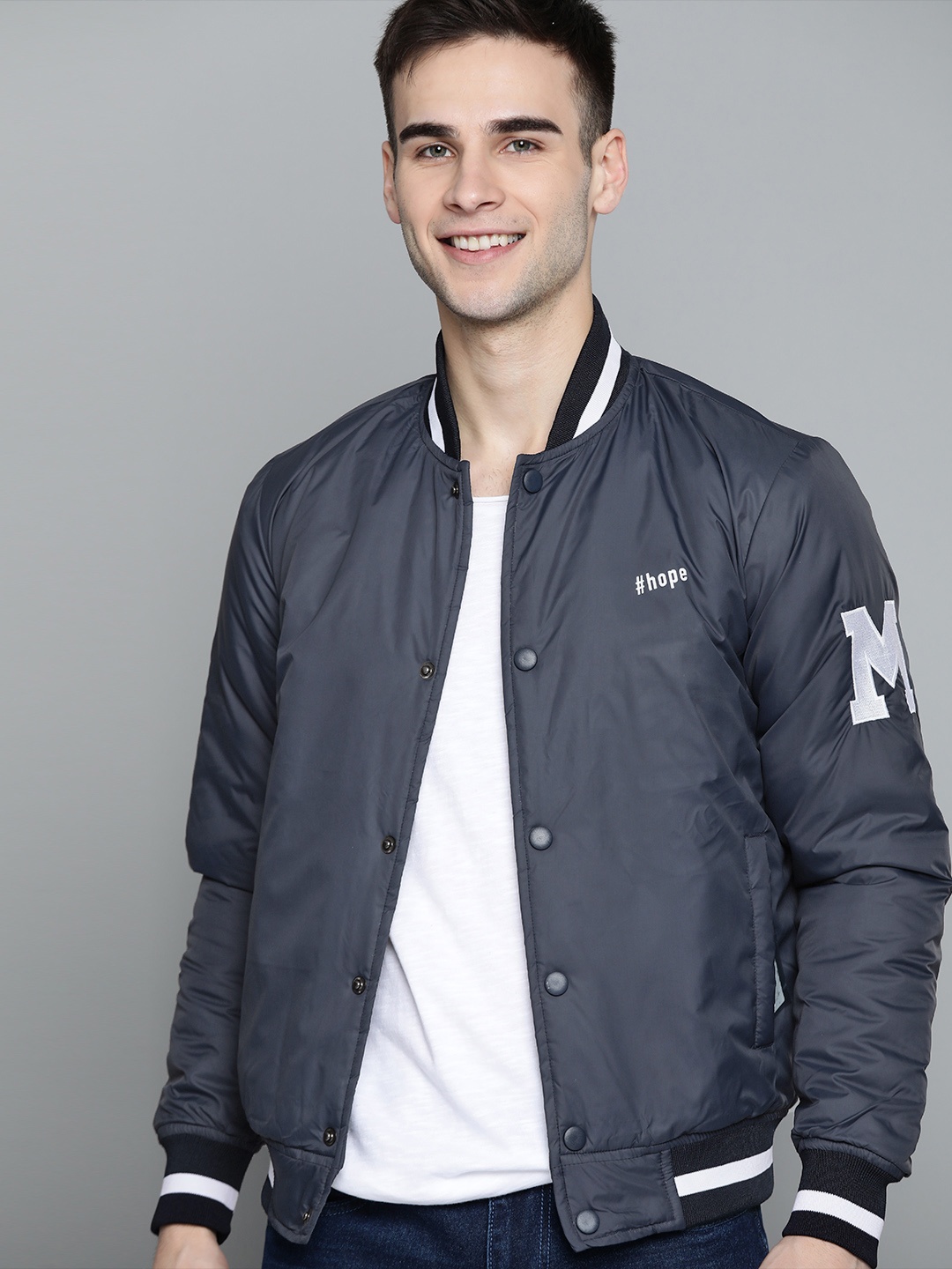 

Mast & Harbour Men Navy Blue Solid Varsity Jacket