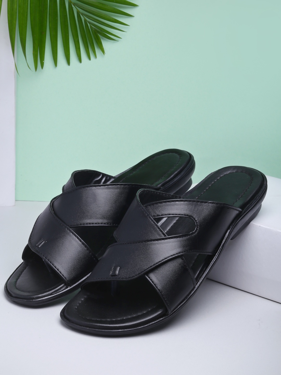 

DEAS Men Black Textured Open Toe Flats with Laser Cuts