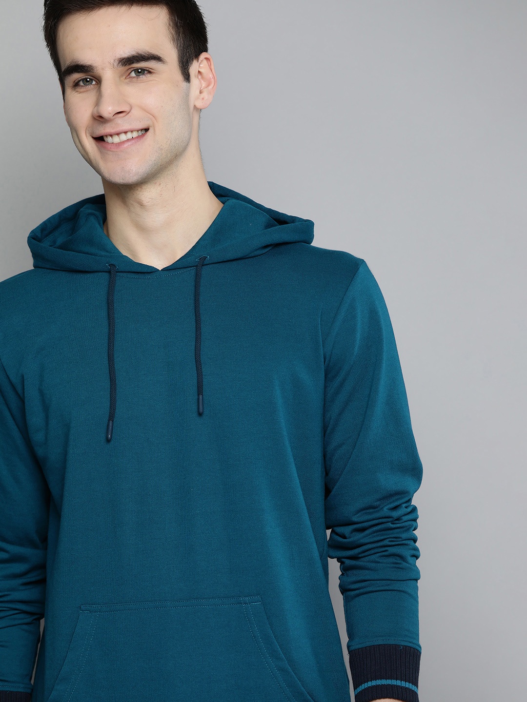 

Mast & Harbour Men Teal Blue Hooded Sweatshirt