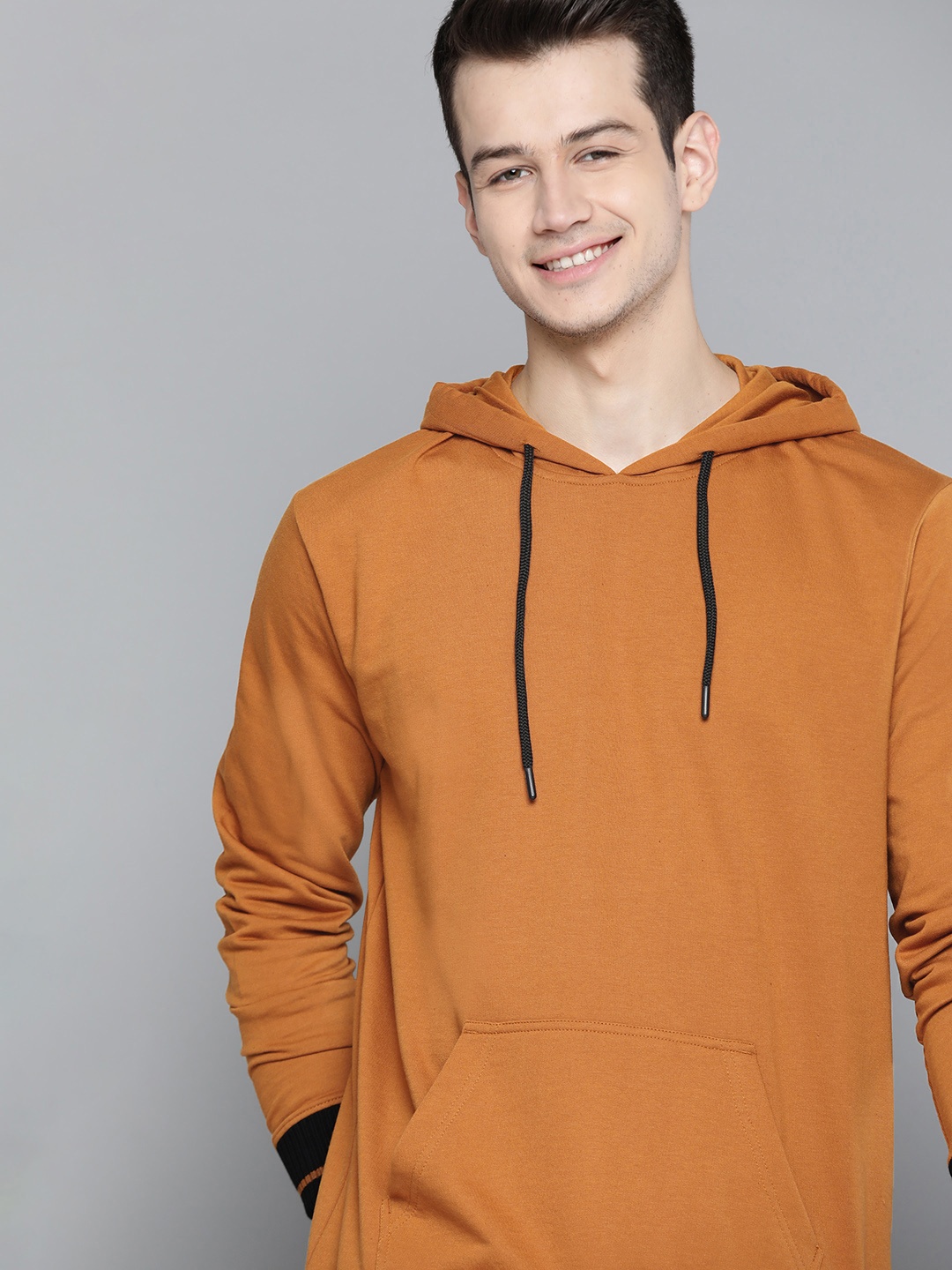 

Mast & Harbour Men Mustard Brown Handcrafted Solid Hooded Sweatshirt