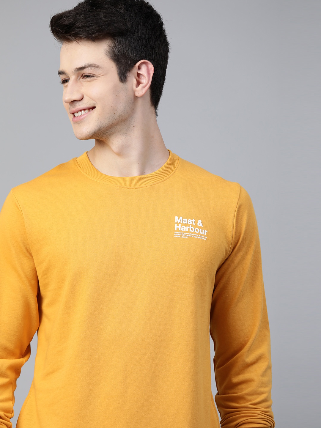 

Mast & Harbour Men Mustard Yellow Solid Sweatshirt