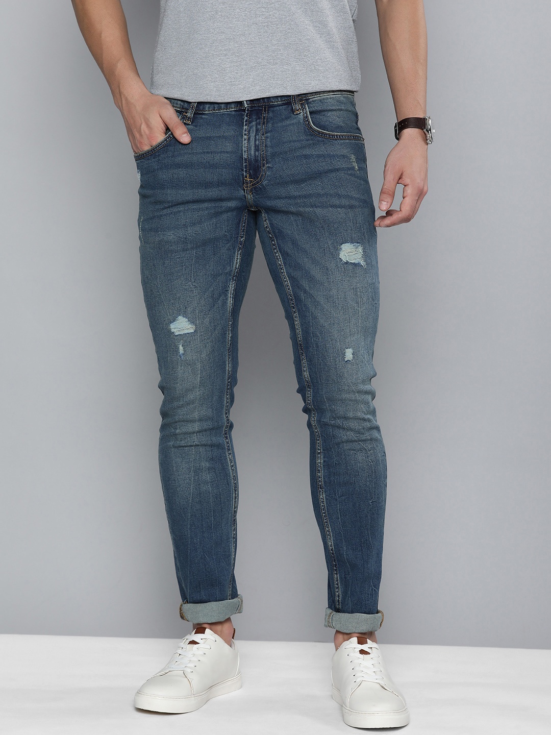 

Indian Terrain Men Blue Skinny Fit Mildly Distressed Light Fade Stretchable Jeans