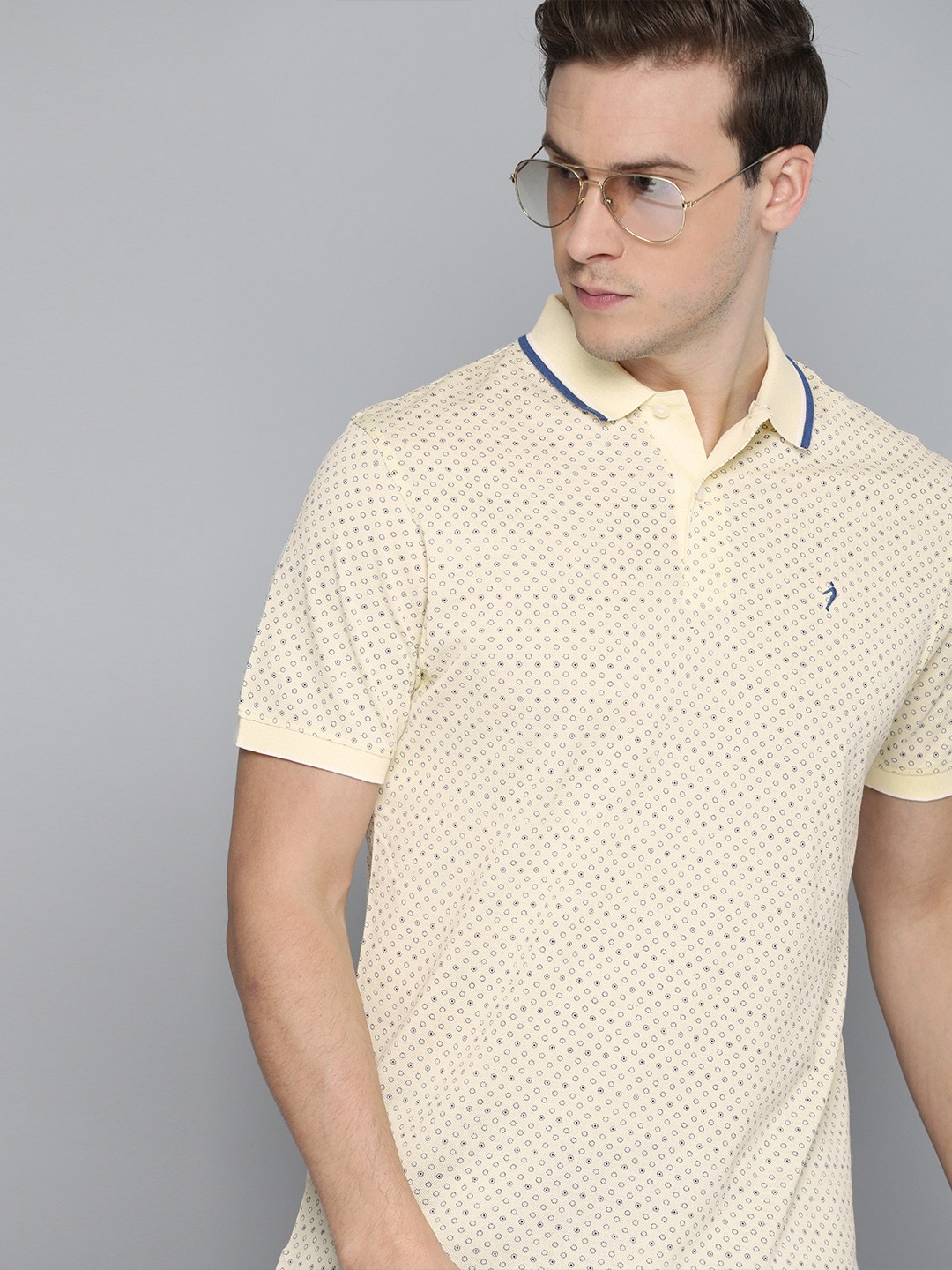 

Indian Terrain Men Yellow Blue Printed Polo Collar Pure Cotton T-shirt