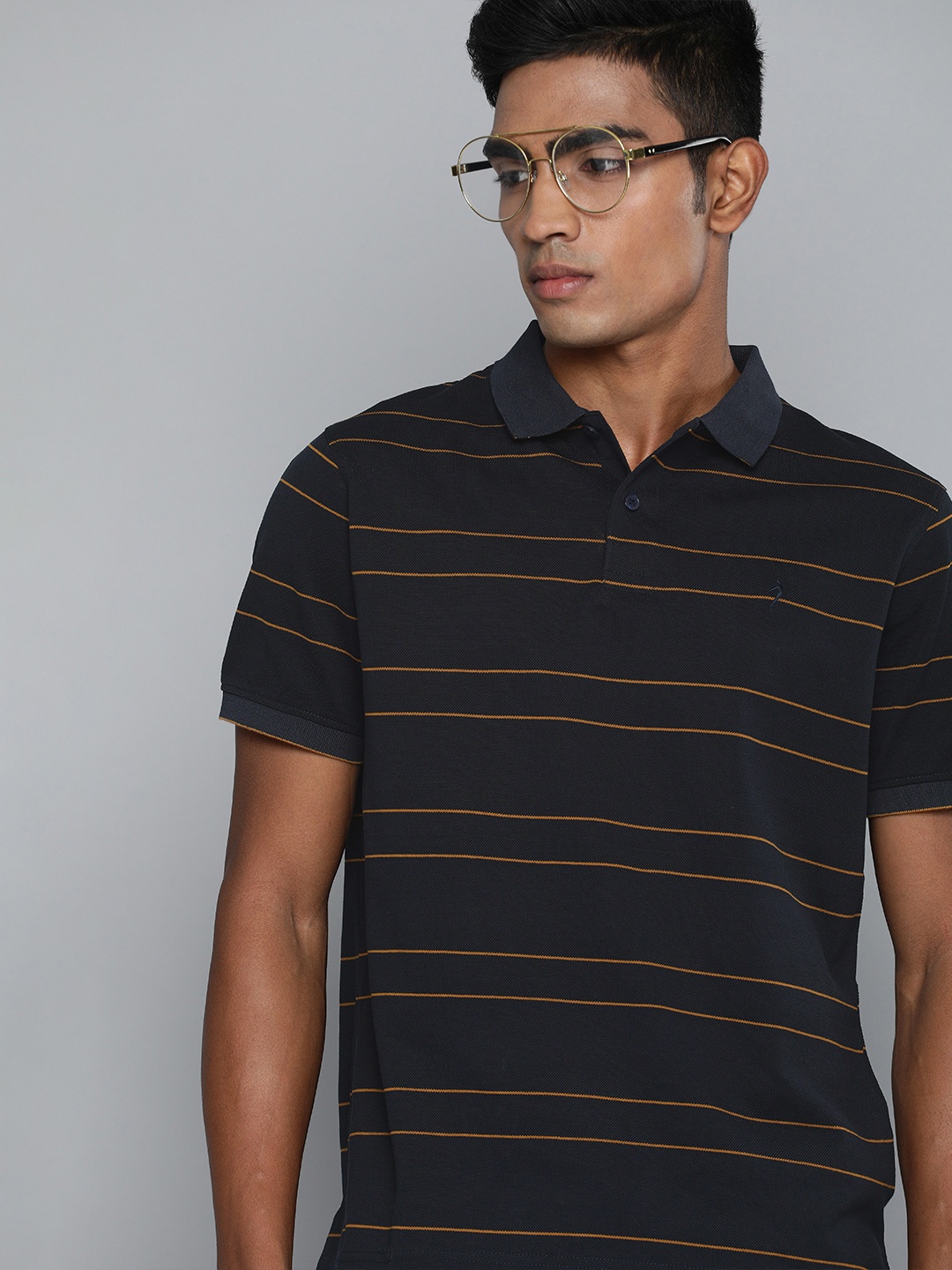 

Indian Terrain Men Navy Blue Mustard Yellow Striped Polo Collar Pure Cotton T-shirt