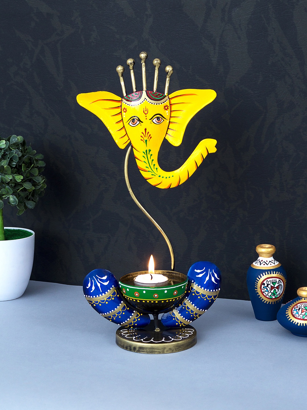 

Golden Peacock Yellow Handcrafted & Handpainted Ganesha Tea Light Candle Holder