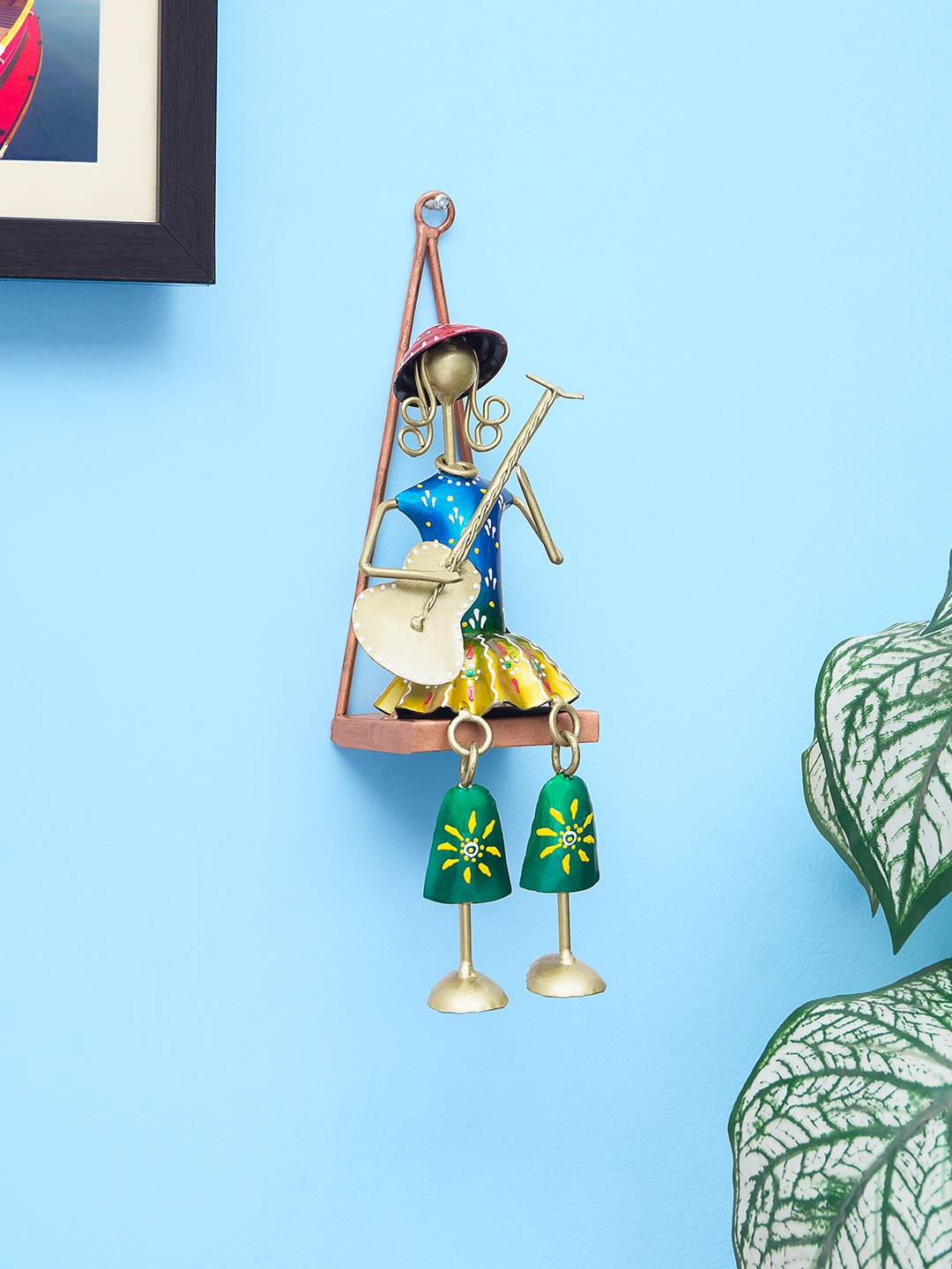 

Golden Peacock Gold-Toned & Blue Handpainted Musician Doll Wall Decor