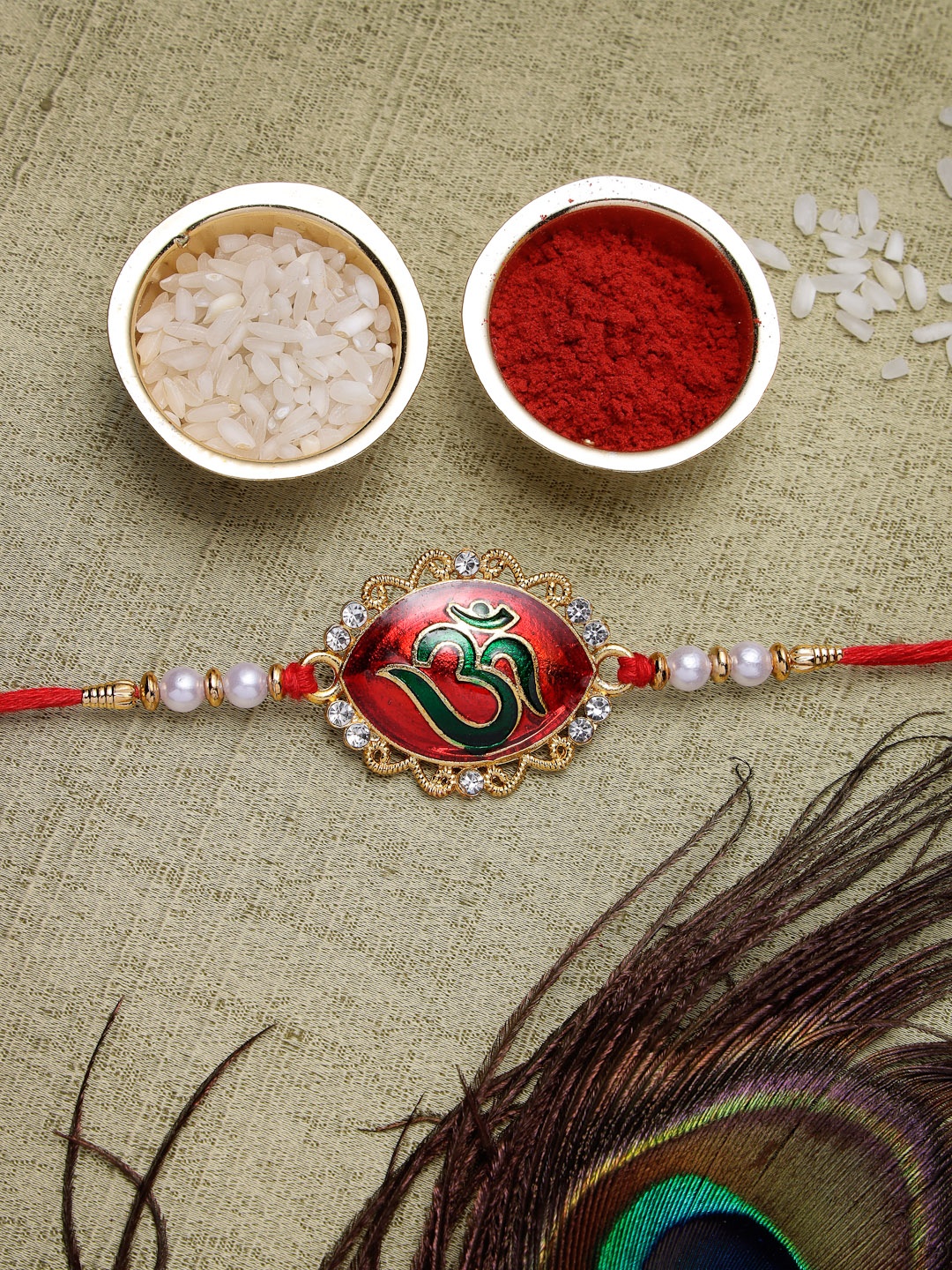 

Sukkhi Rakhi Men Gold-Plated Red & Green Stone-Studded & Beaded Rakhi With Roli Chawal & Raksha Bandhan Greeting Card