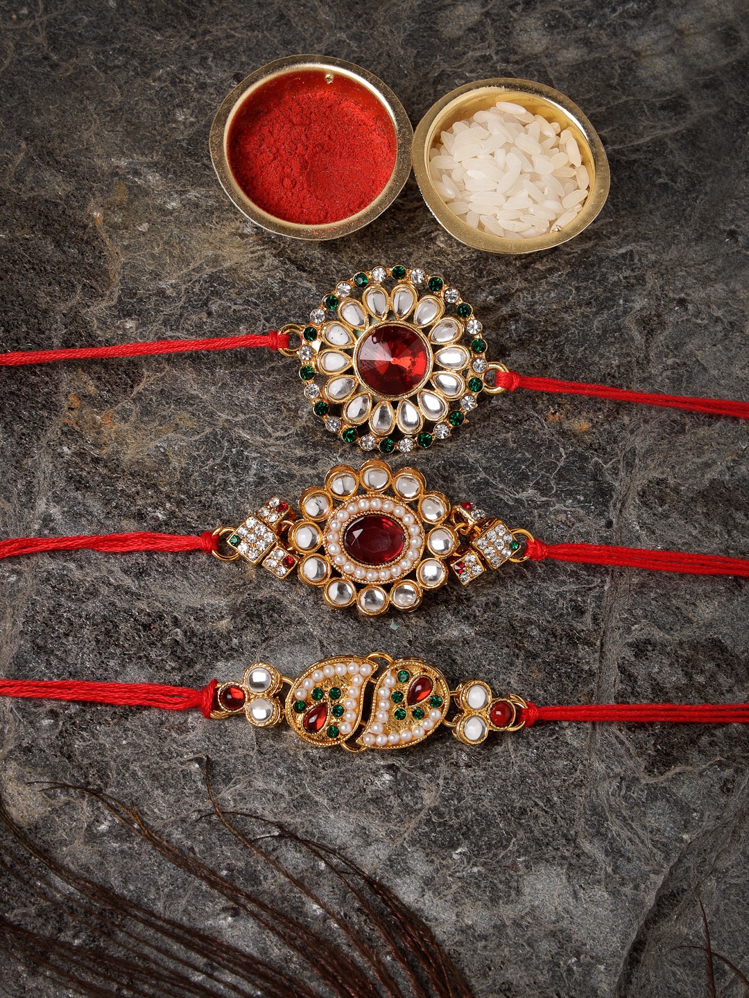 

Sukkhi Rakhi Men Set Of 3 Gold-Plated Red & White Stone-Studded Rakhi with Roli Chawal & Card