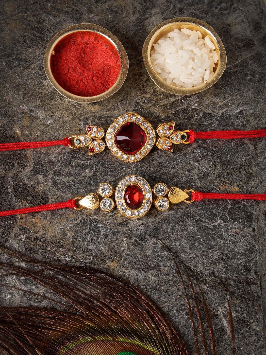 

Sukkhi Rakhi Men Set Of 2 Gold-Plated Red & White Stone-Studded Rakhi With Roli Chawal & Greeting Card