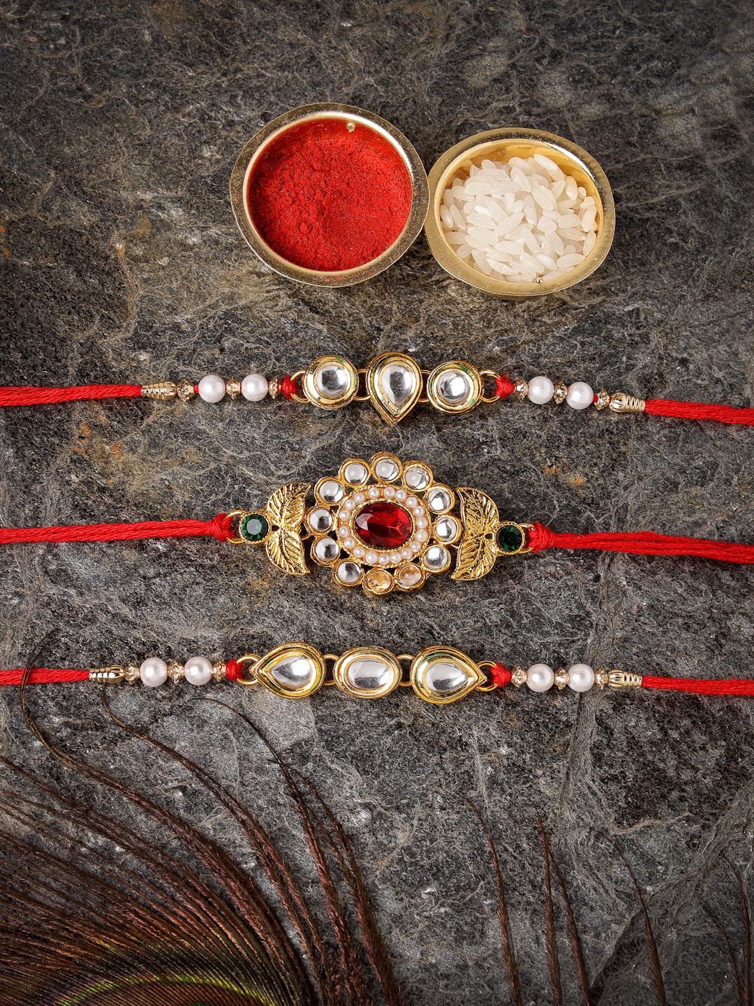

Sukkhi Rakhi Men Set Of 3 Gold-Plated Stone-Studded Beaded Rakhi With Roli Chawal & Greeting Card, Red