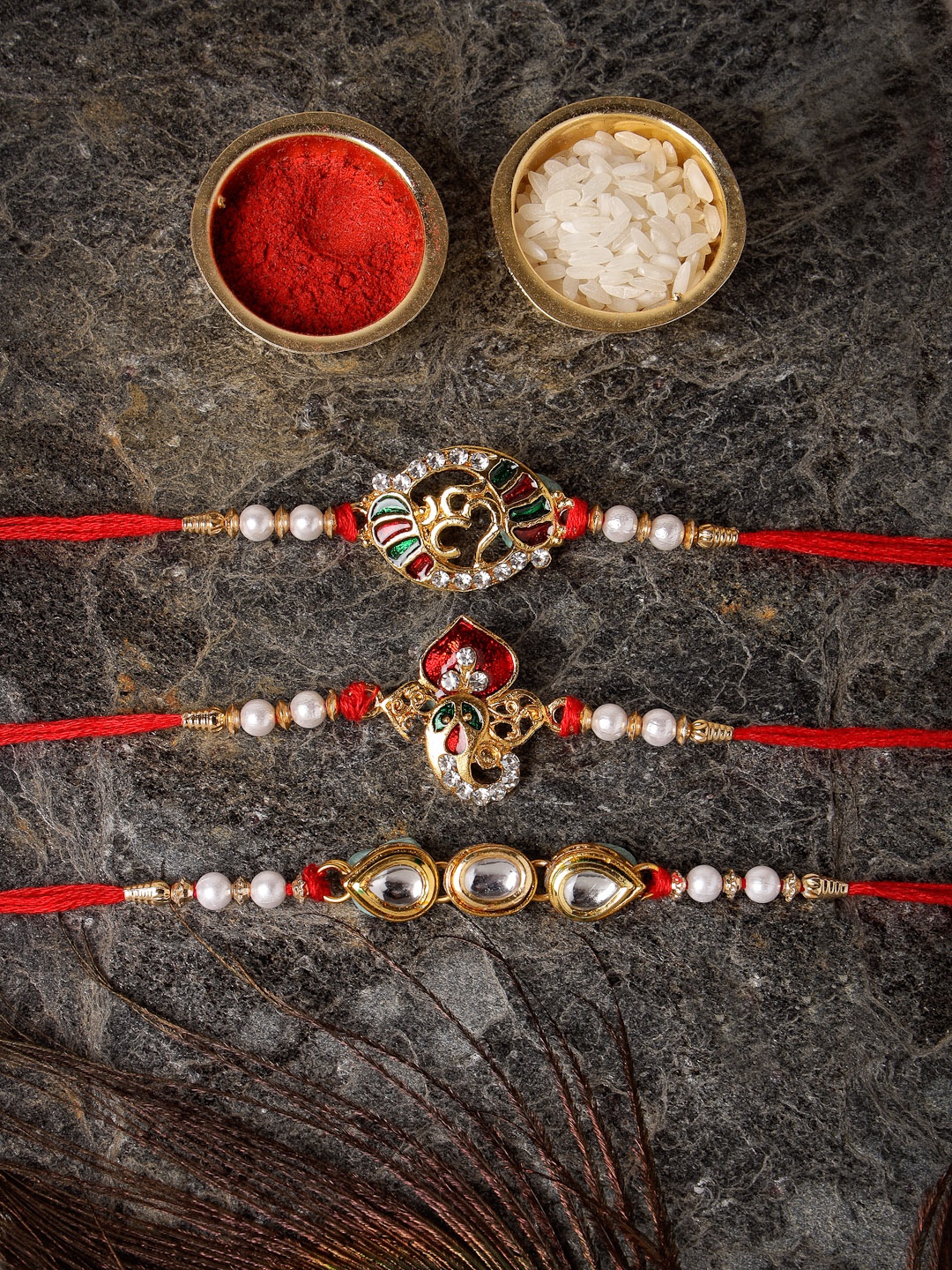 

Sukkhi Rakhi Men Set Of 3 Gold-Plated Stone-Studded Beaded Rakhi With Roli Chawal & Greeting Card