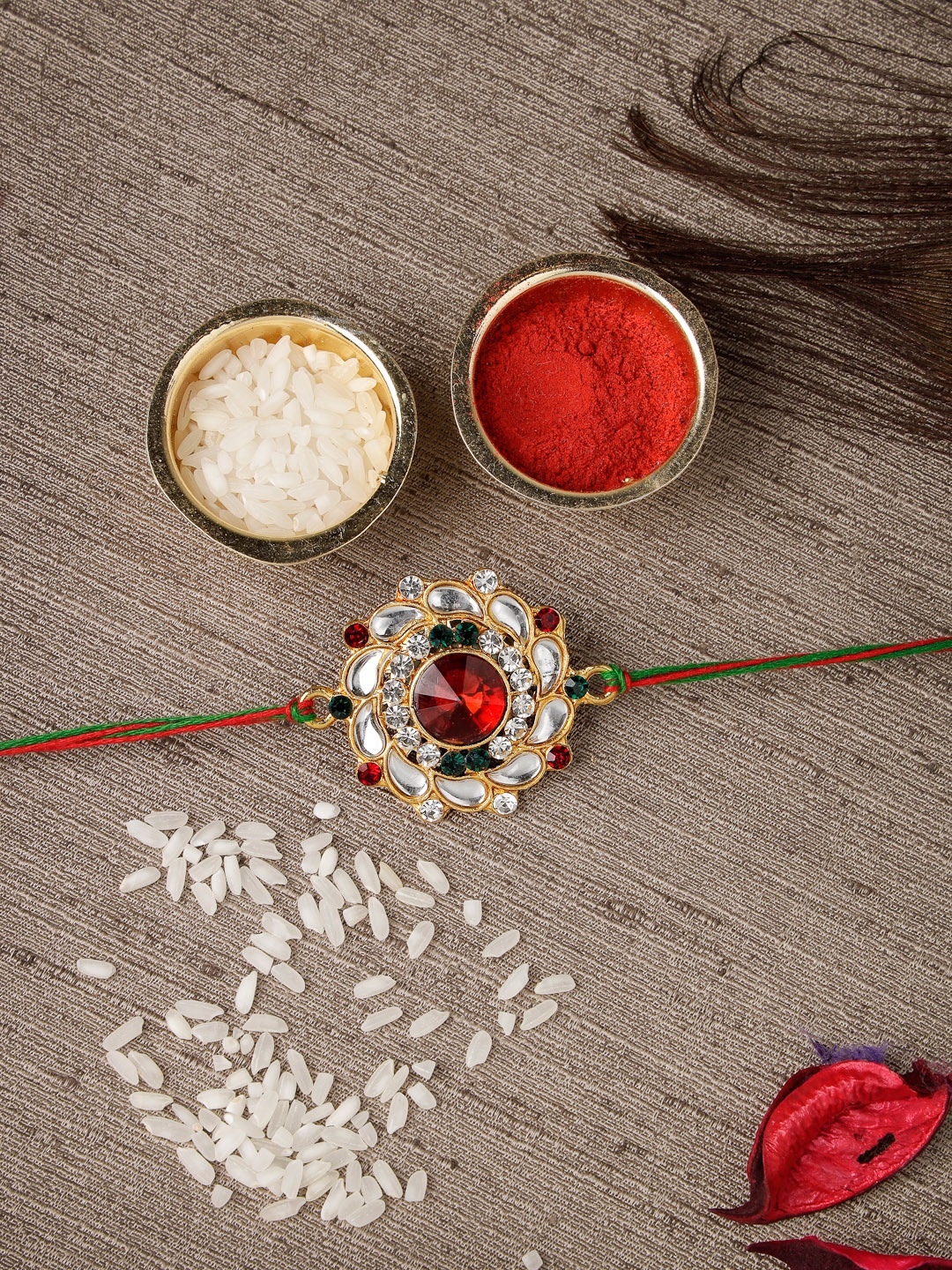 

Sukkhi Rakhi Men Red Gold-Plated Stone Studded Rakhi With Roli Chawal & Greeting Card