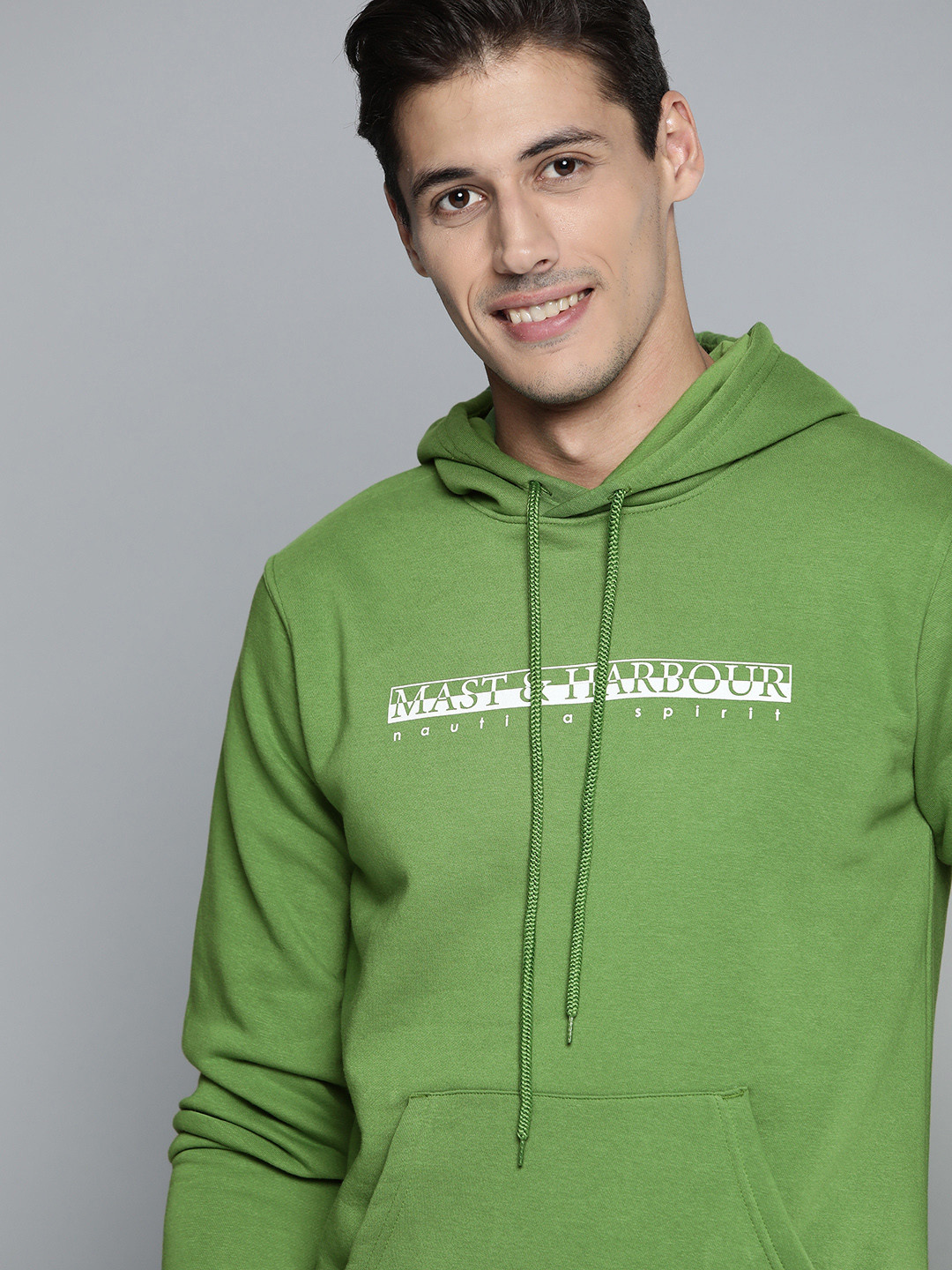 

Mast & Harbour Men Green Printed Hooded Sweatshirt