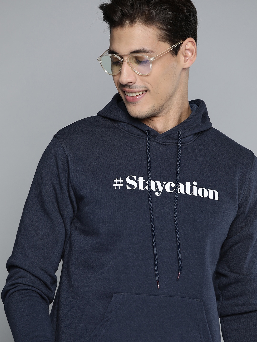 

Mast & Harbour Men Navy Blue Printed Hooded Sweatshirt