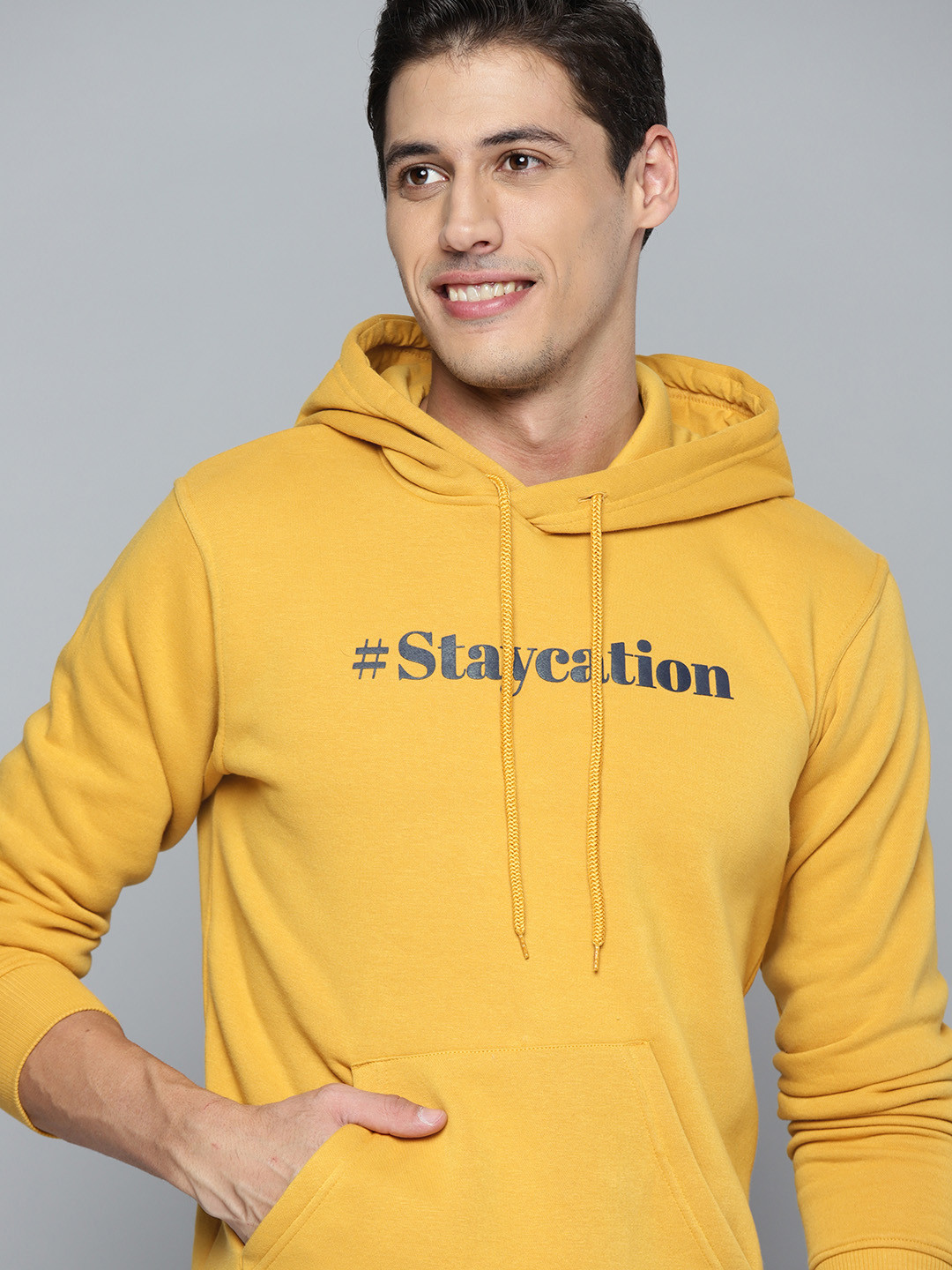 

Mast & Harbour Men Yellow Printed Hooded Sweatshirt