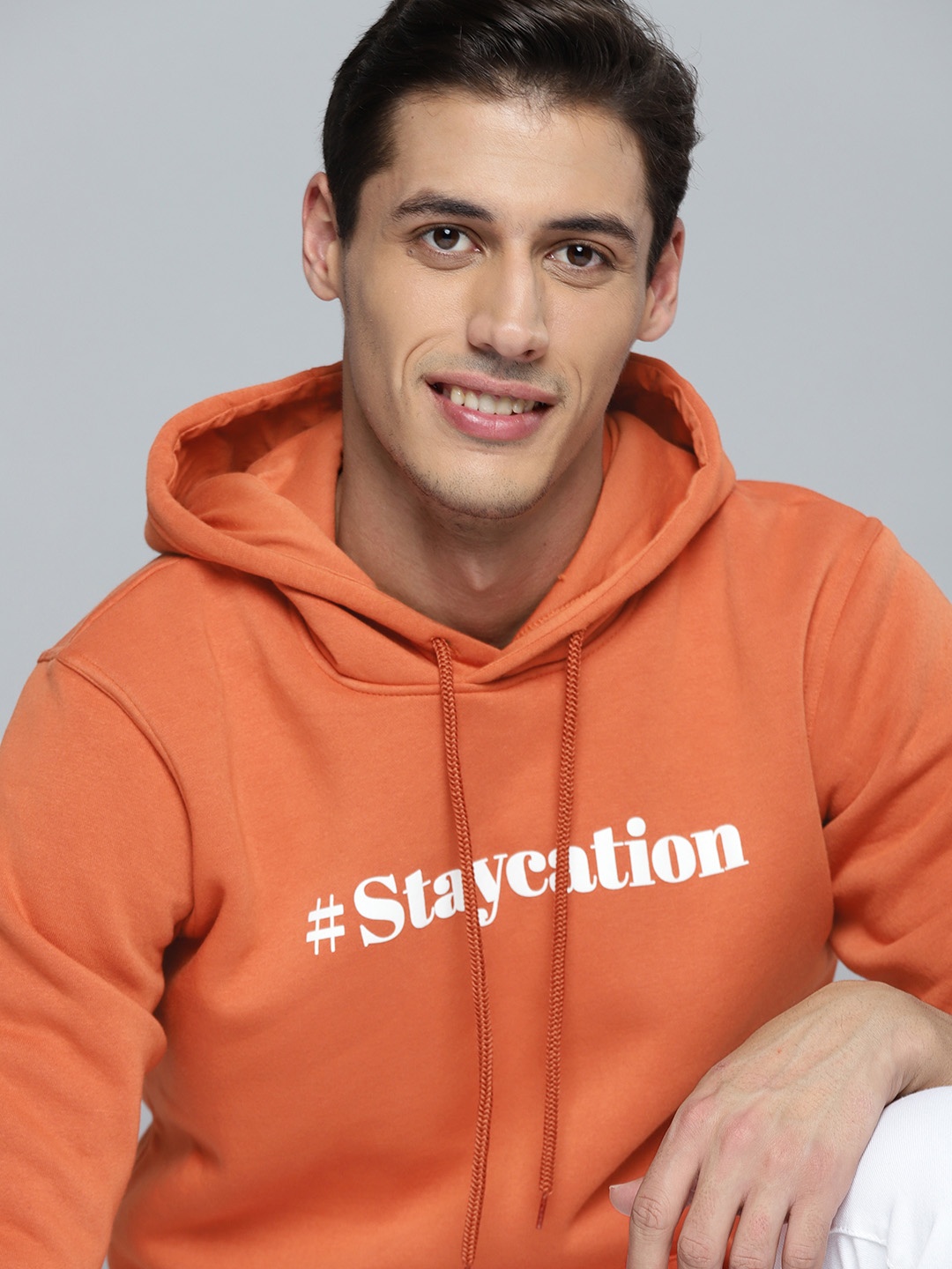 

Mast & Harbour Men Orange Printed Hooded Sweatshirt