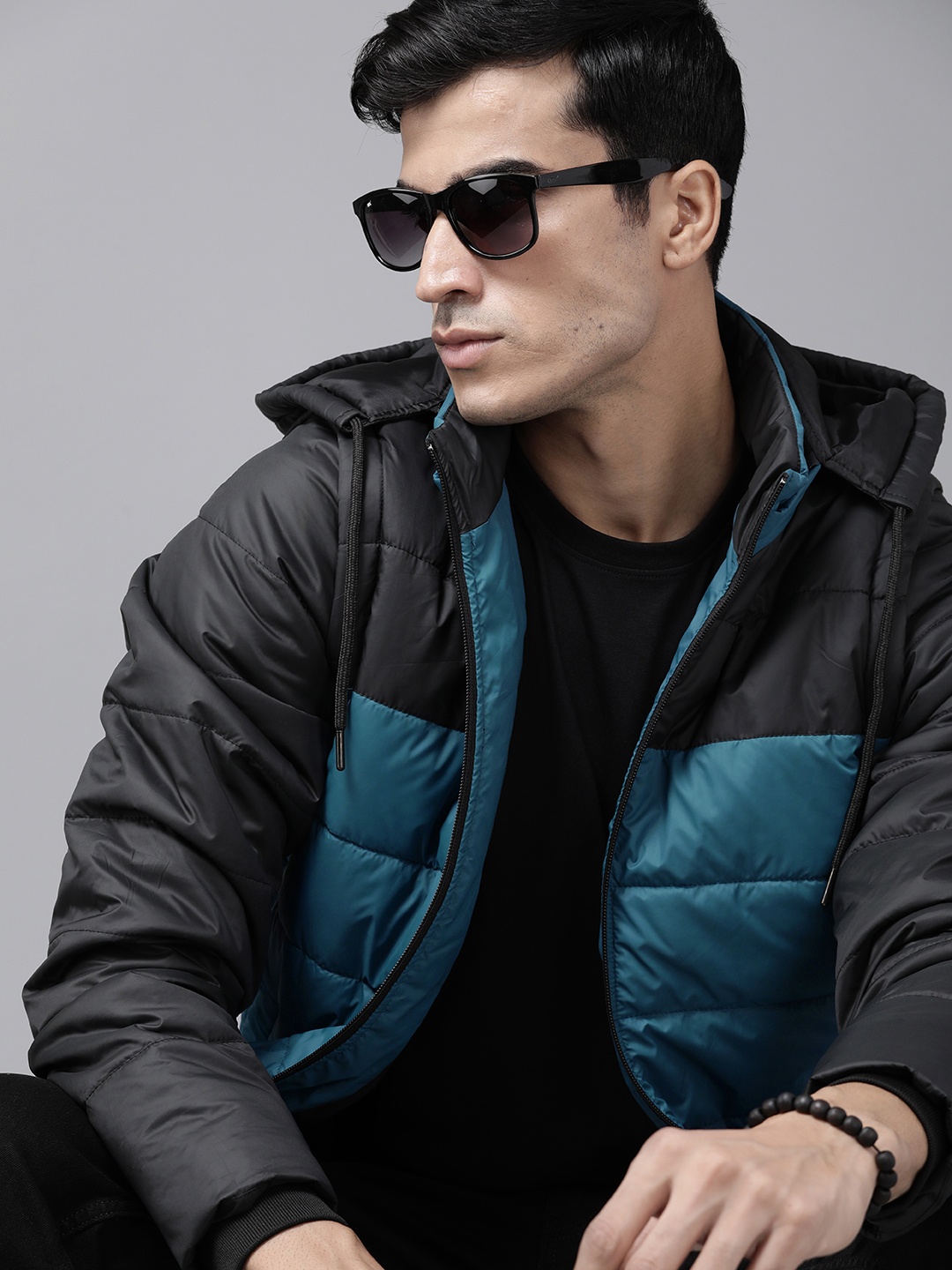 

Roadster Men Blue & Black Detachable Hood Colourblocked Padded Jacket
