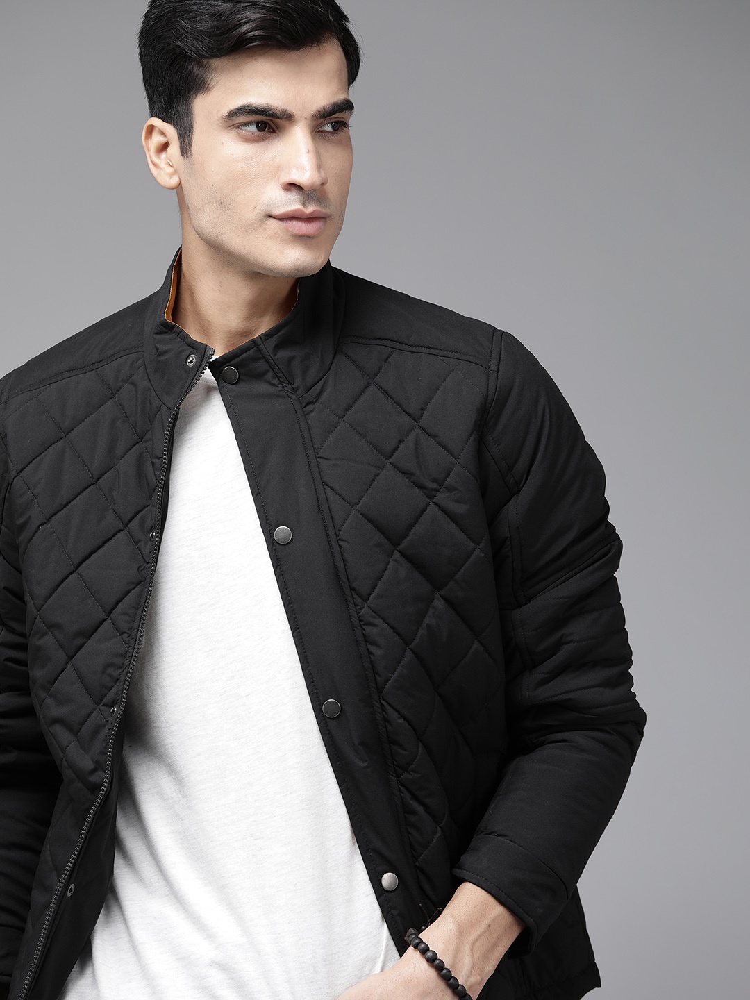

Roadster Men Black Solid Quilted Jacket