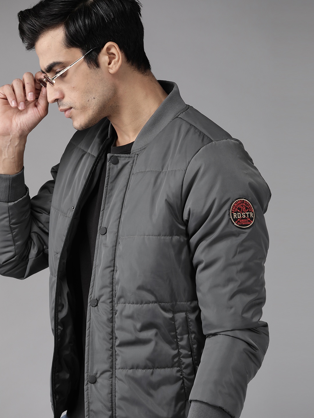 

Roadster Men Charcoal Grey Solid Padded Jacket