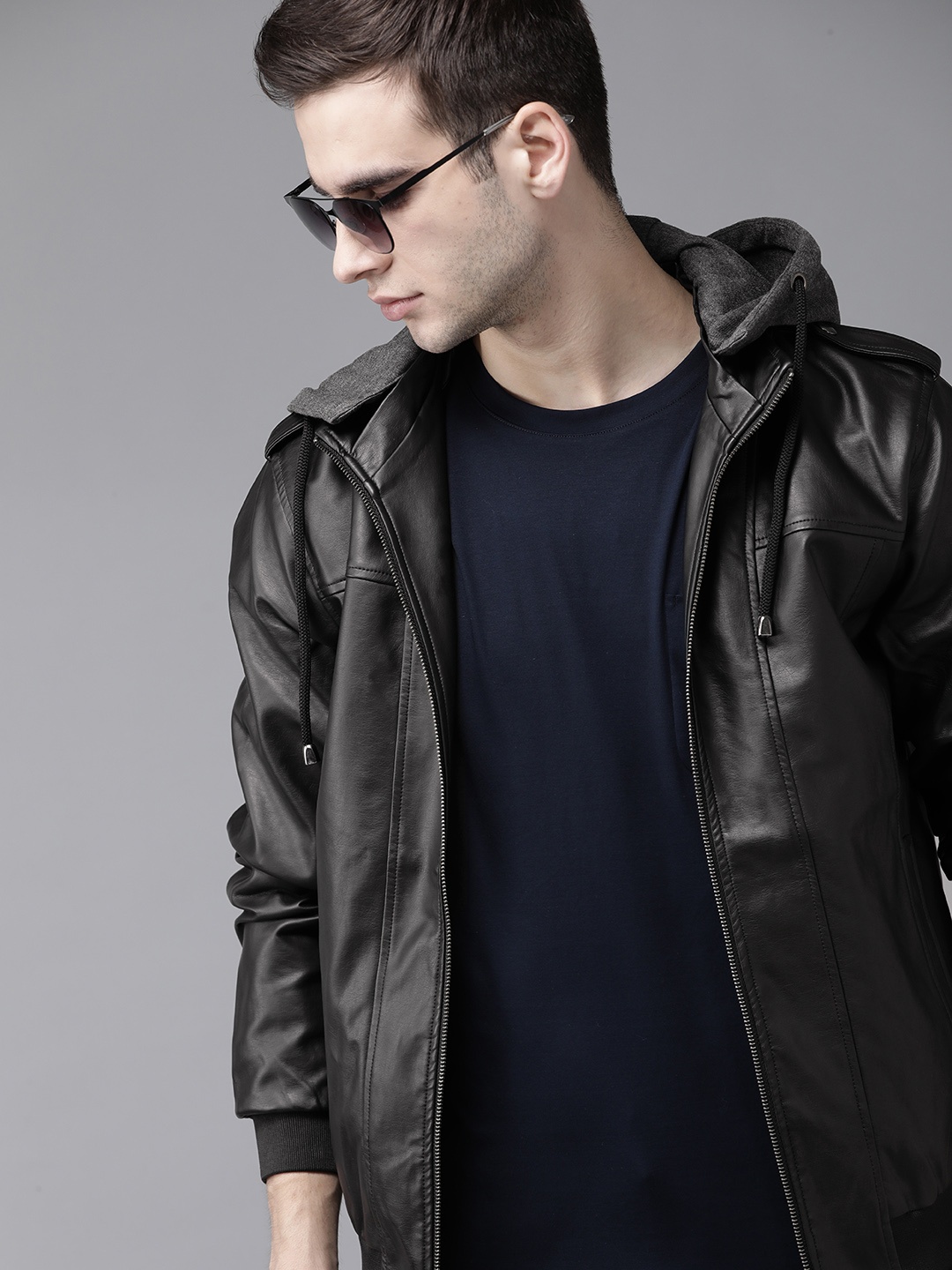 

Roadster Men Black Solid Tailored Jacket with Detachable Hood