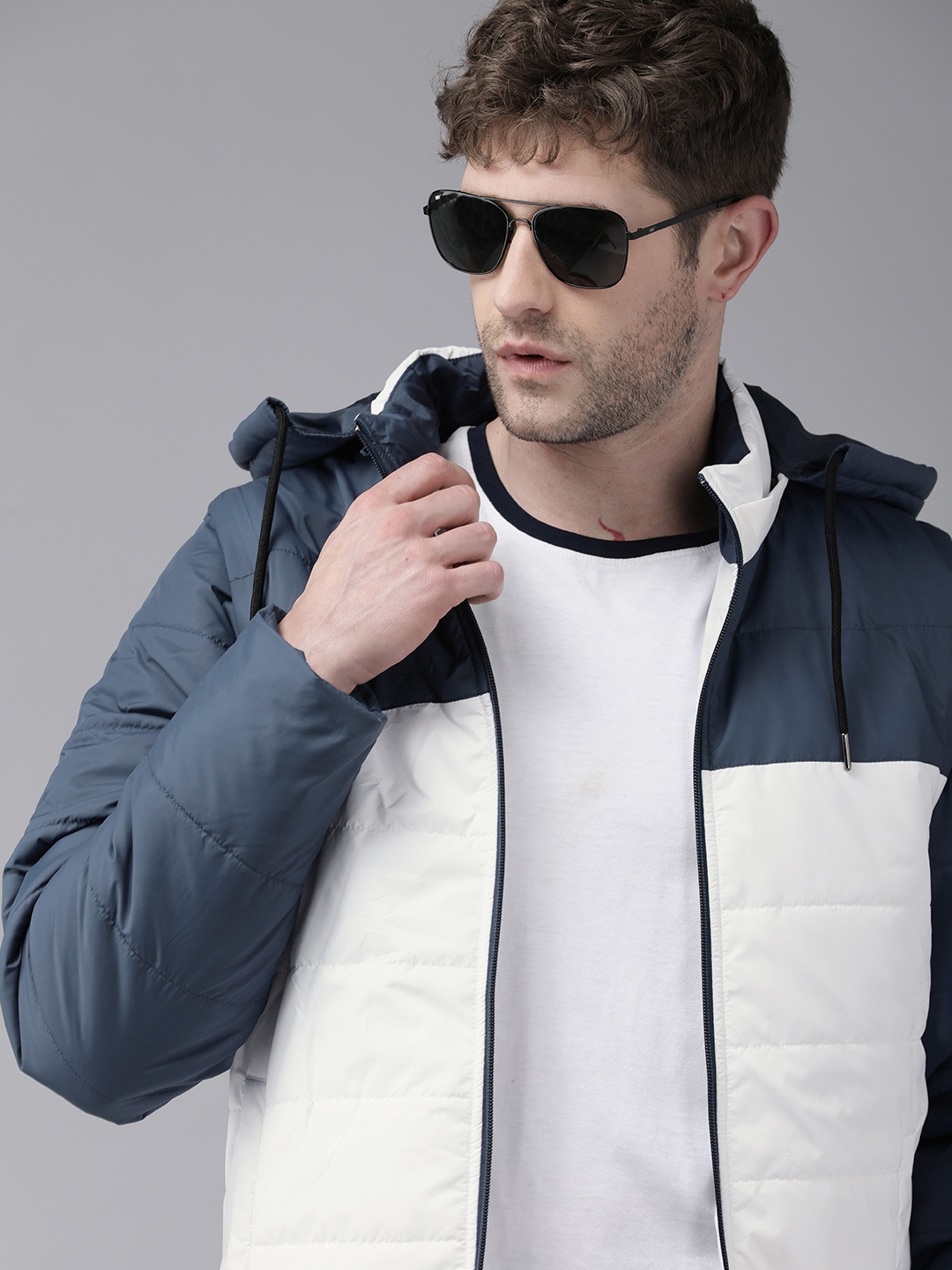 

Roadster Men Navy Blue & White Colourblocked Hooded Padded Jacket