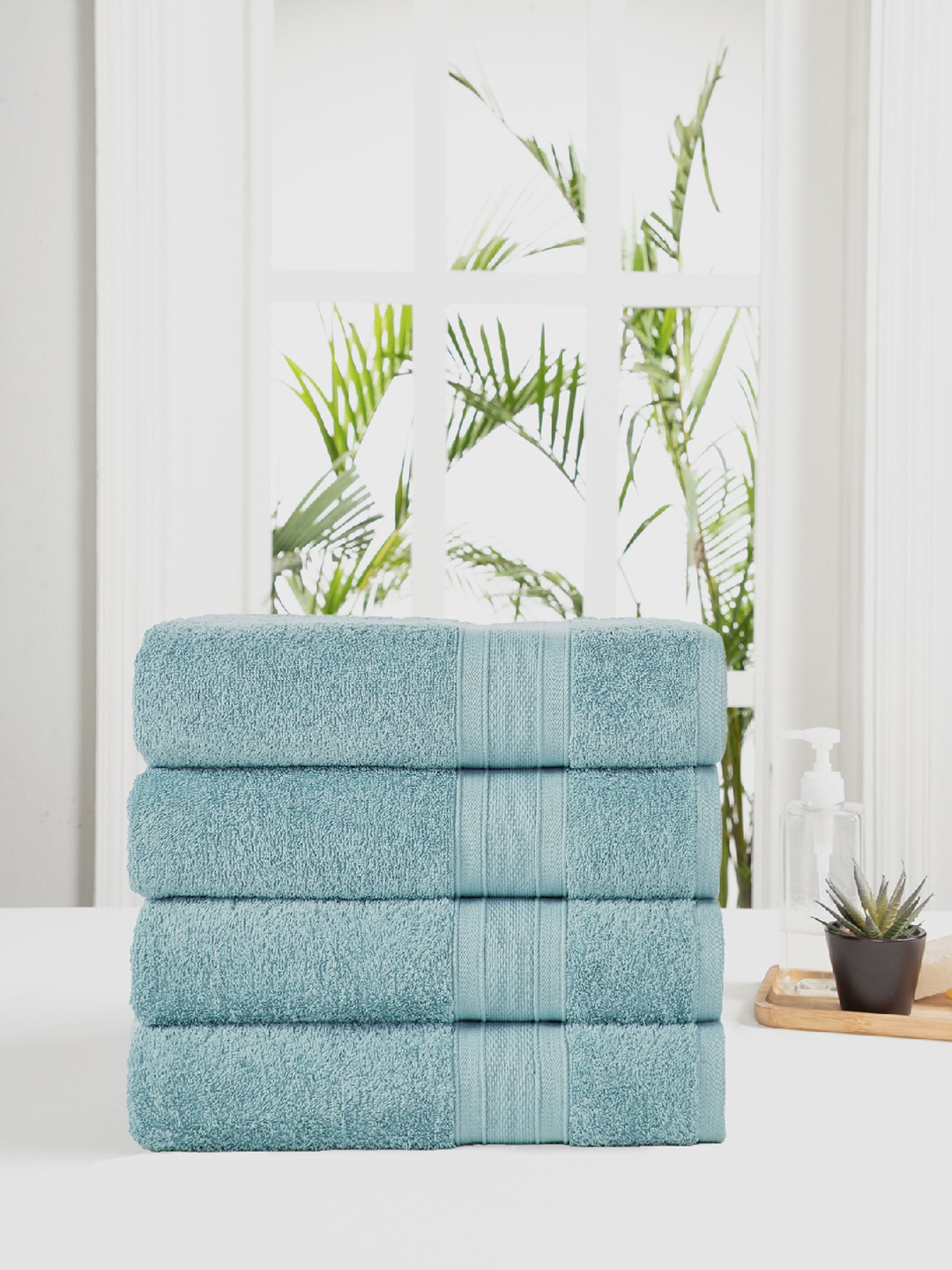 

Trident Unisex Set Of 4 Blue Solid 500 GSM Pure Cotton Bath Towels