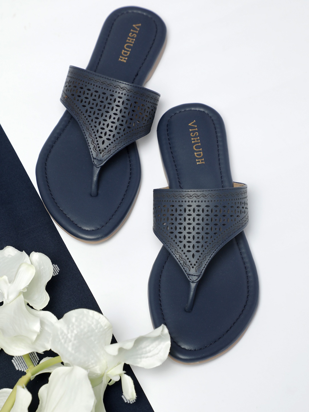

Vishudh Women Blue T-Strap Flats with Laser Cuts