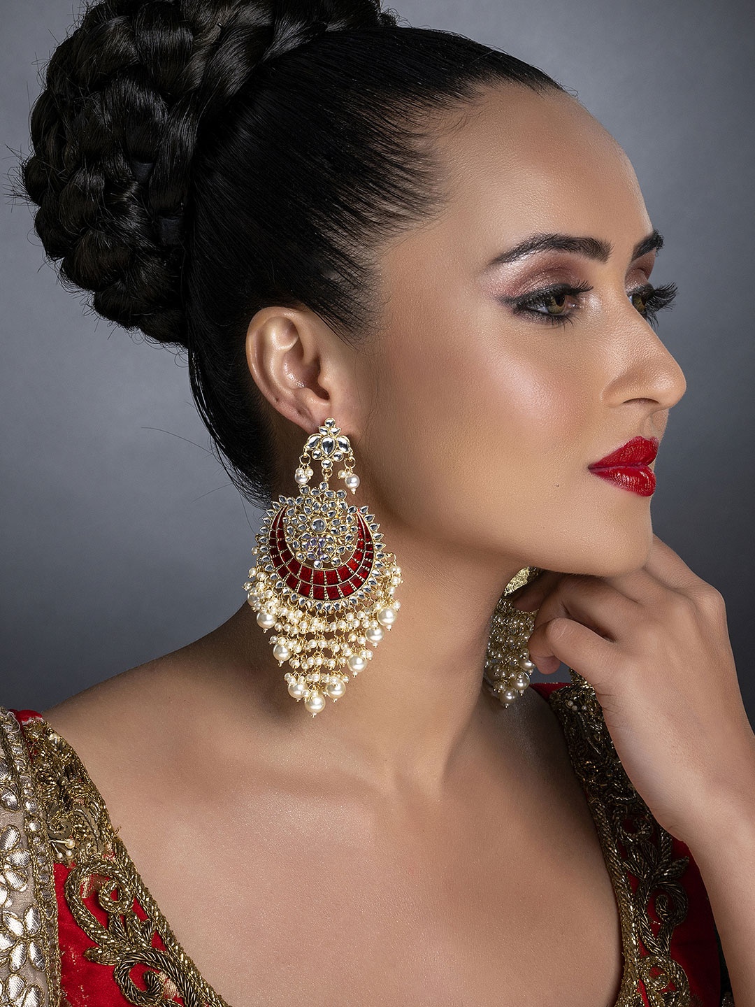 

Sukkhi Red Gold-Plated Kundan Studded Handcrafted Chandbalis Earrings