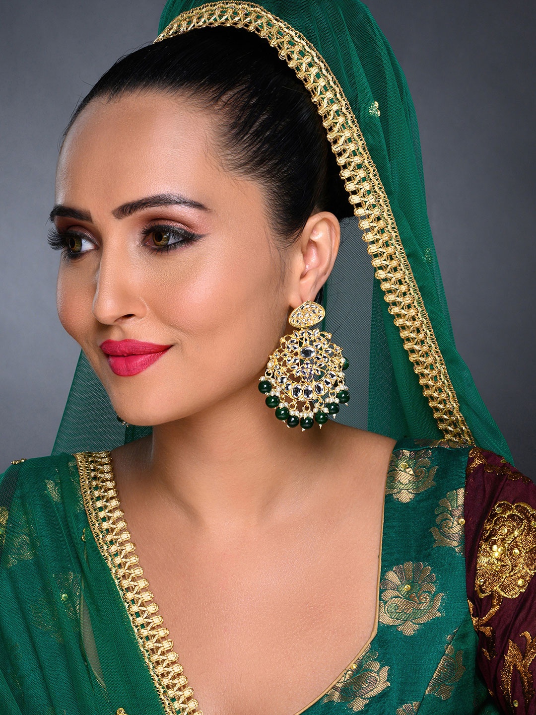

Sukkhi White Gold-Plated Kundan Studded Handcrafted Crescent Shaped Chandbalis