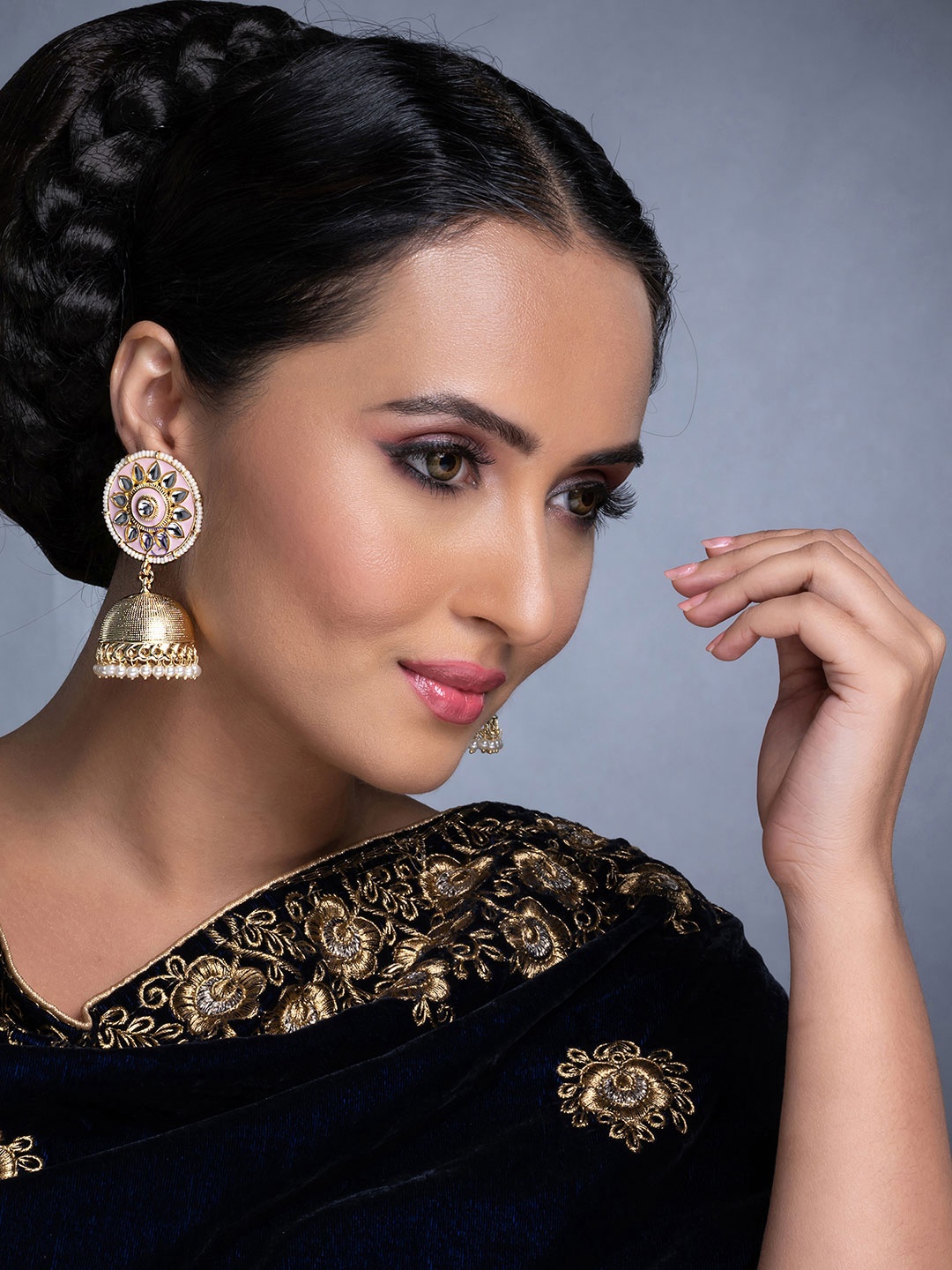 

Sukkhi Pink Gold-Plated Kundan Studded Handcrafted Dome Shaped Jhumkas