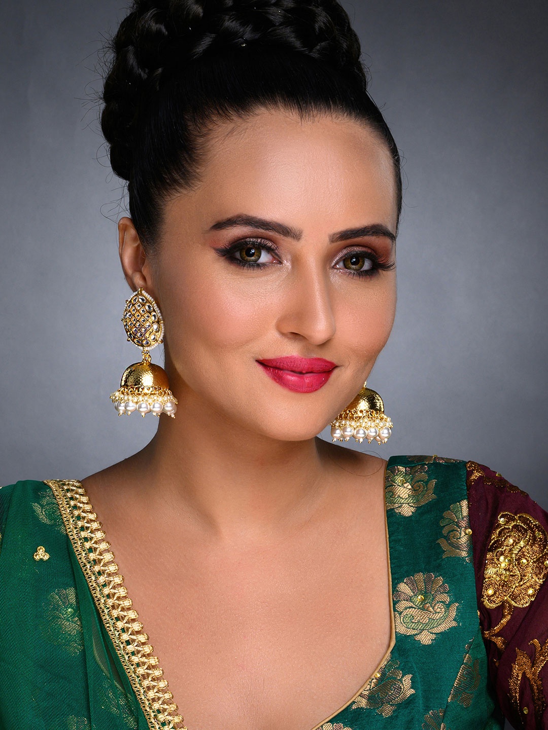 

Sukkhi White Gold-Plated Kundan Studded Handcrafted Shaped Jhumkas