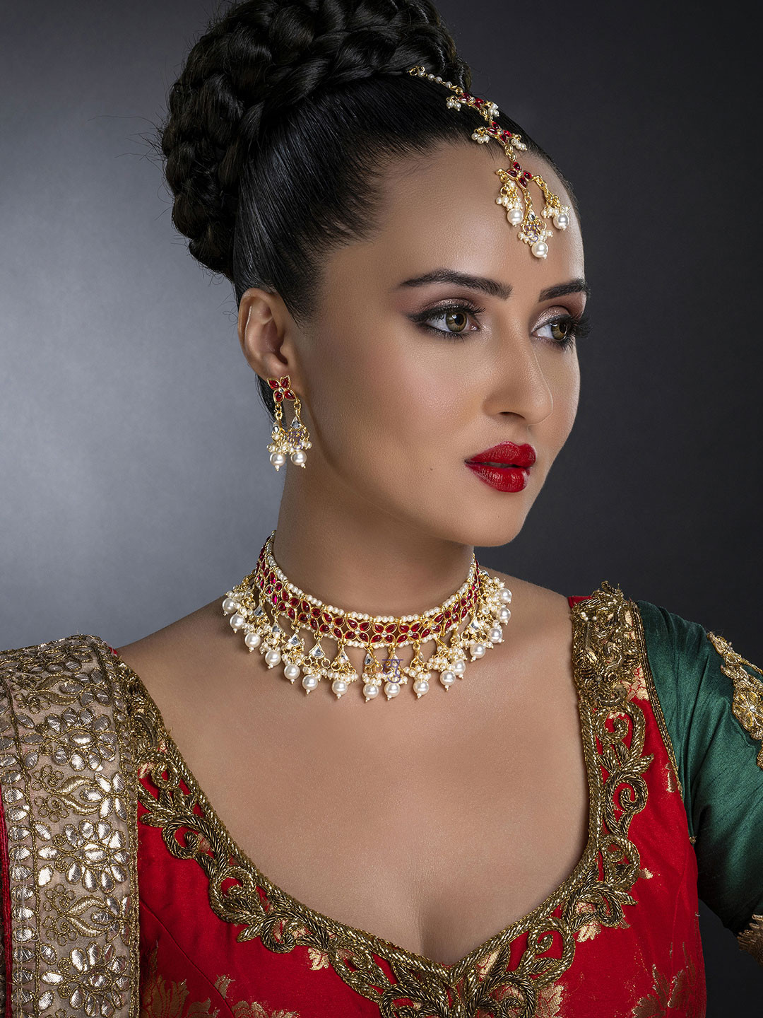 

Sukkhi Gold-Plated Red & White Kundan-Studded & Pearl Beaded Jewellery Set