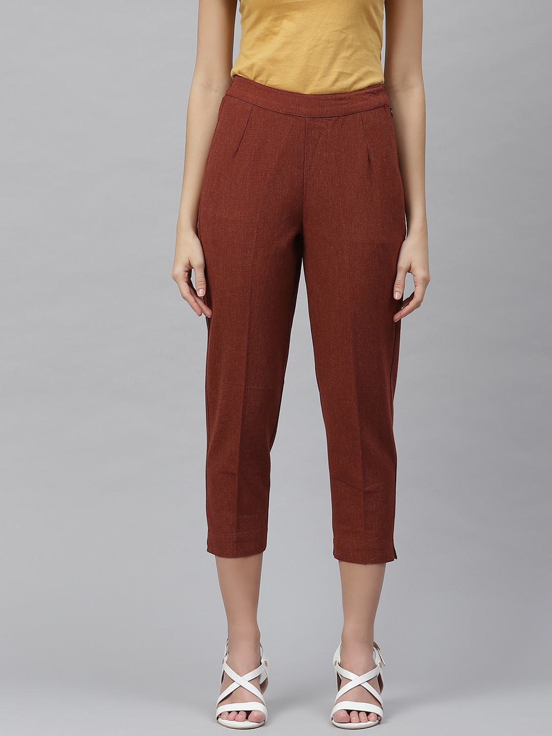 

Fabindia Women Rust Red Pure Cotton Cropped Cigarette Trousers