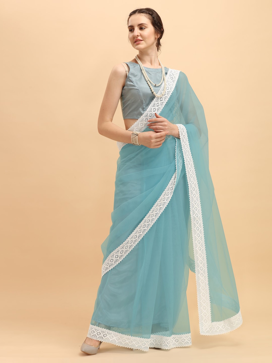 

Sangria Blue Net Saree