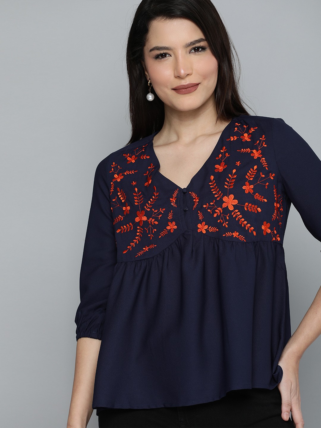 

Chemistry Navy Blue & Red Floral Embroidered V - Neck Empire Top