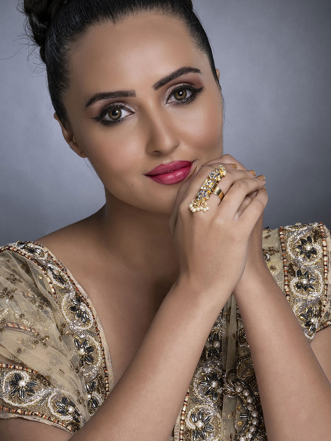 

Sukkhi Gold-Plated White Kundan-Studded & Beaded Adjustable Finger Ring