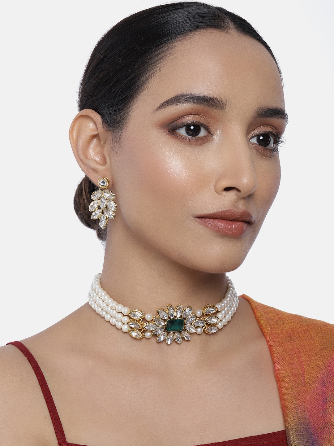 

Peora White & Green Gold Plated Handcrafted Kundan & Pearl Studded Jewellery Set