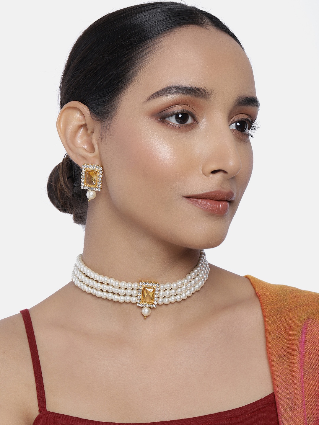 

Peora White & Orange Gold-Plated Kundan Embellished Jadau Jewellery Set