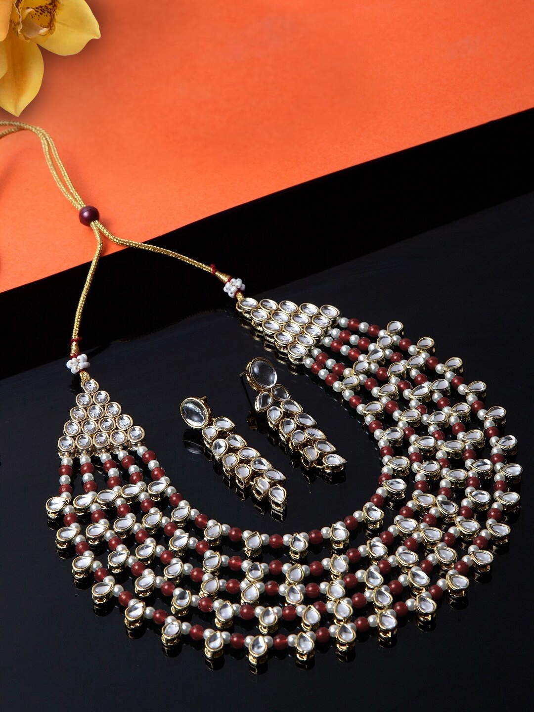 

Peora Gold Plated & Maroon Handcrafted Pearl & Kundan Studded Jewellery Set